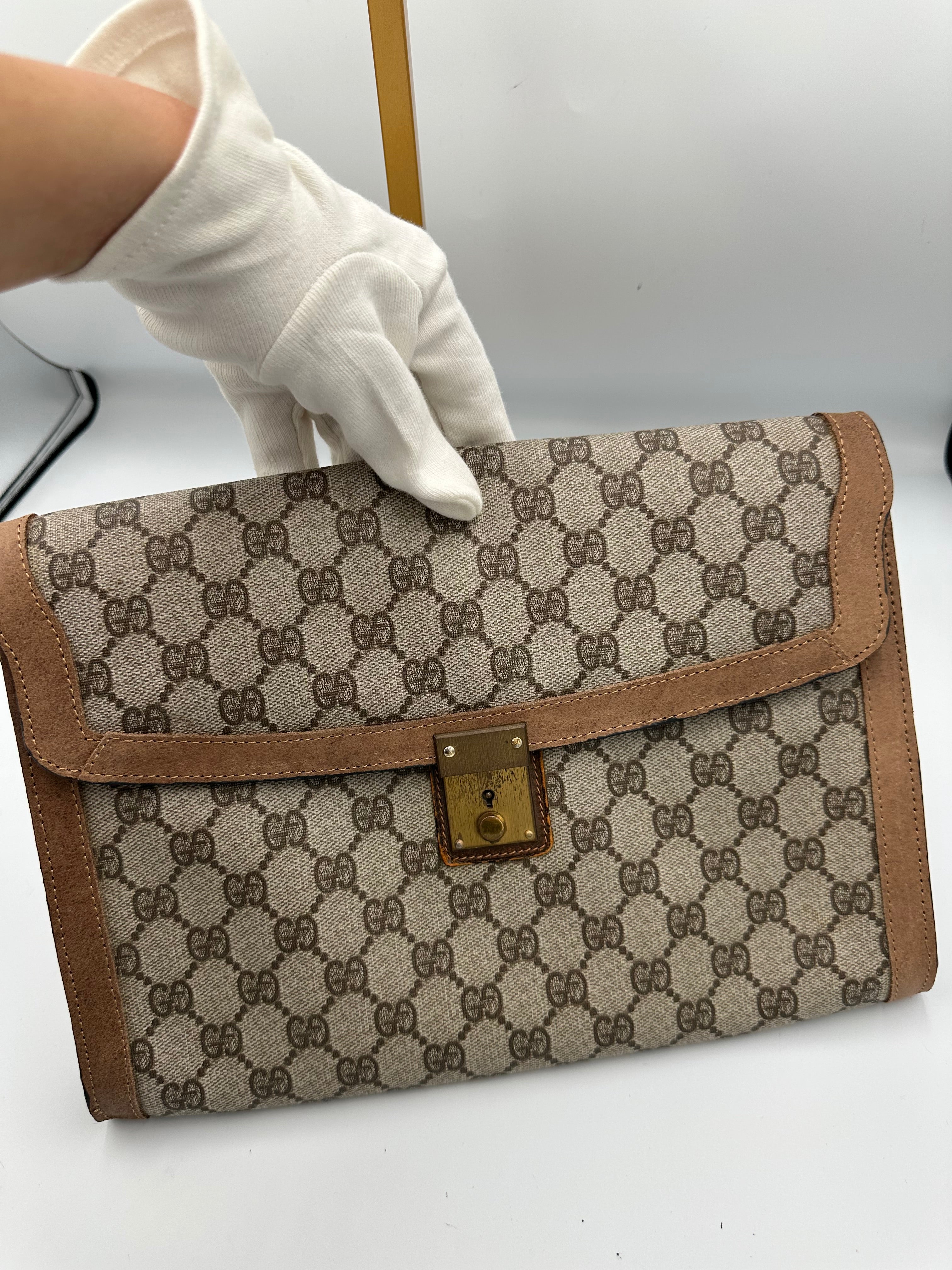 1970s Gucci brown GG leather monogram portfolio clutch bag