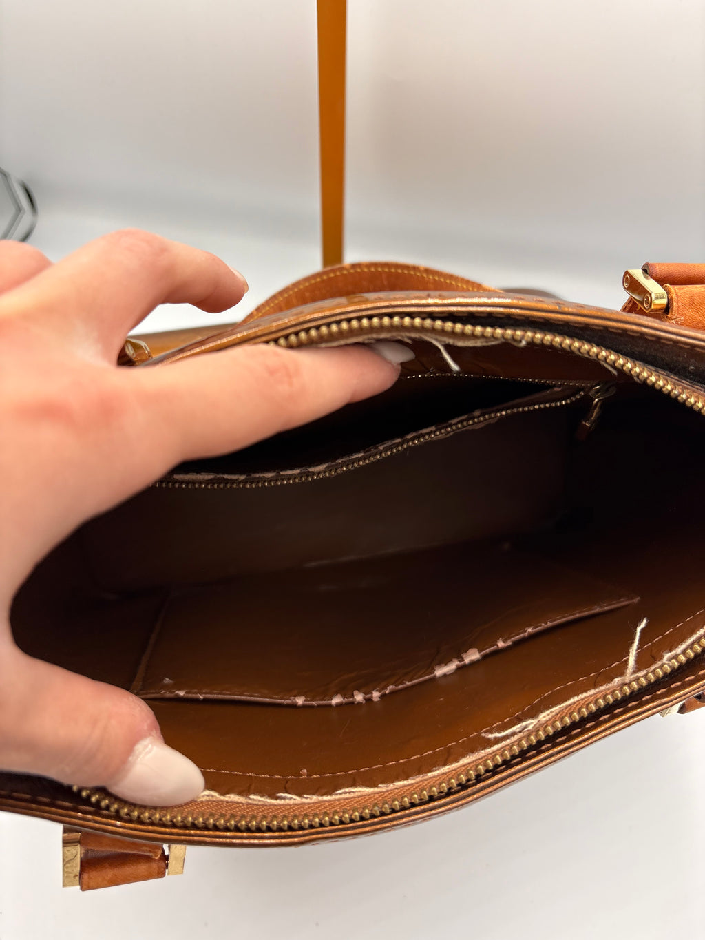 Louis Vuitton Monogram Vernis Houston in bronze