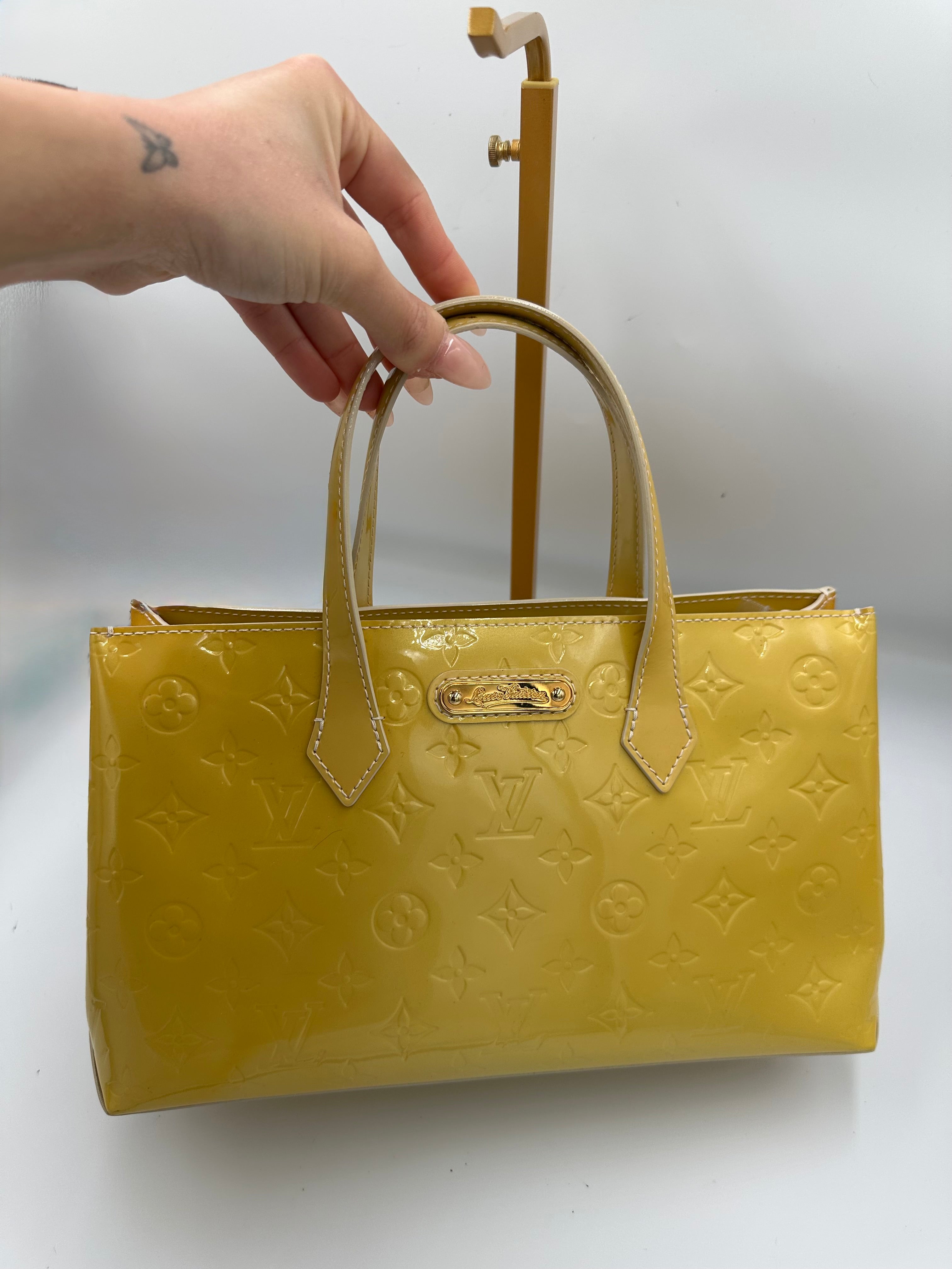 Louis Vuitton Wilshire PM handbag in yellow Monogram Vernis