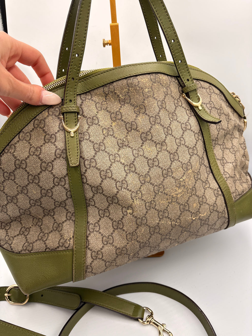 Gucci Ophidia dome top handle bag featuring monogram GG supreme canvas