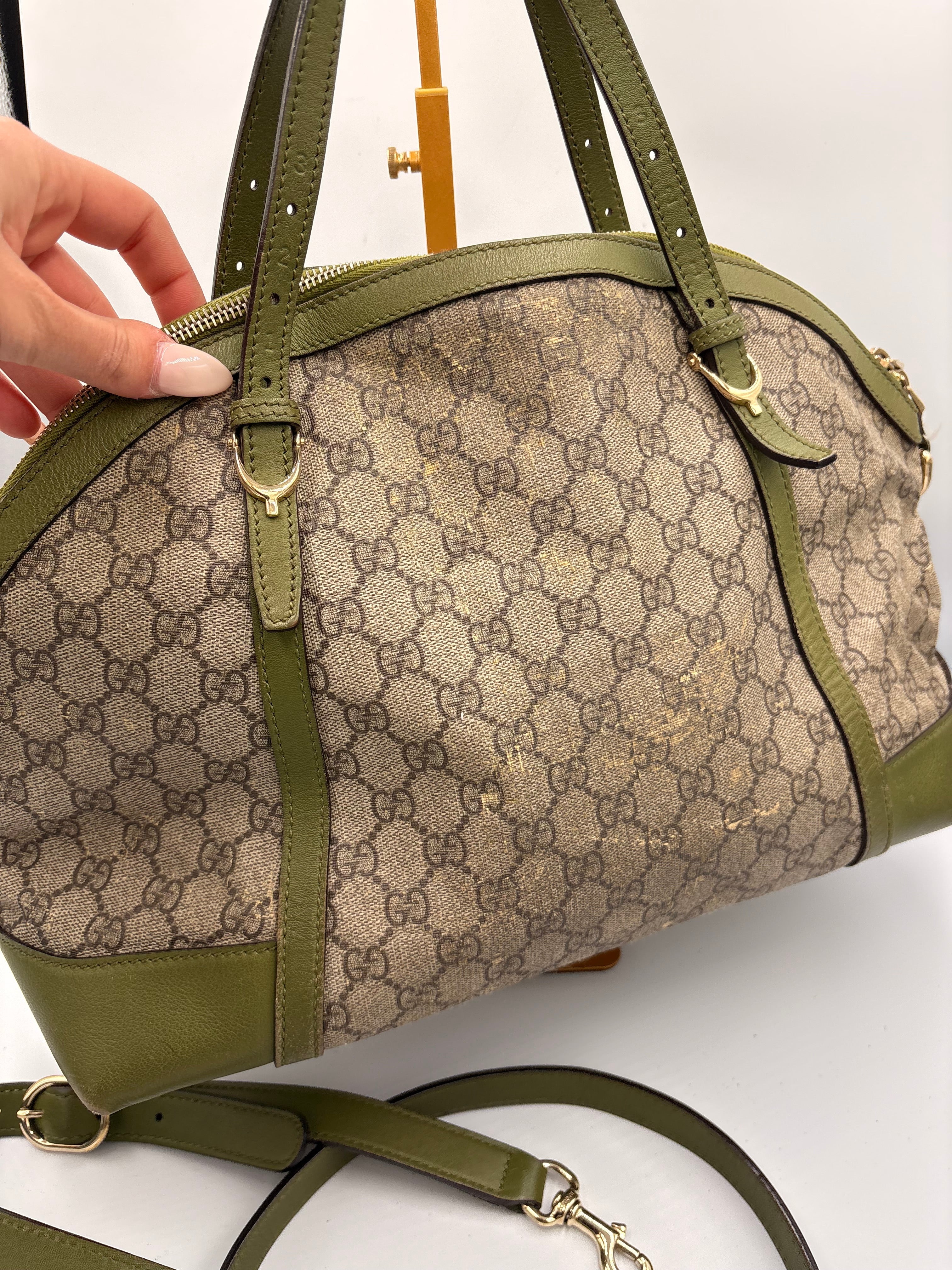 Gucci Ophidia dome top handle bag featuring monogram GG supreme canvas