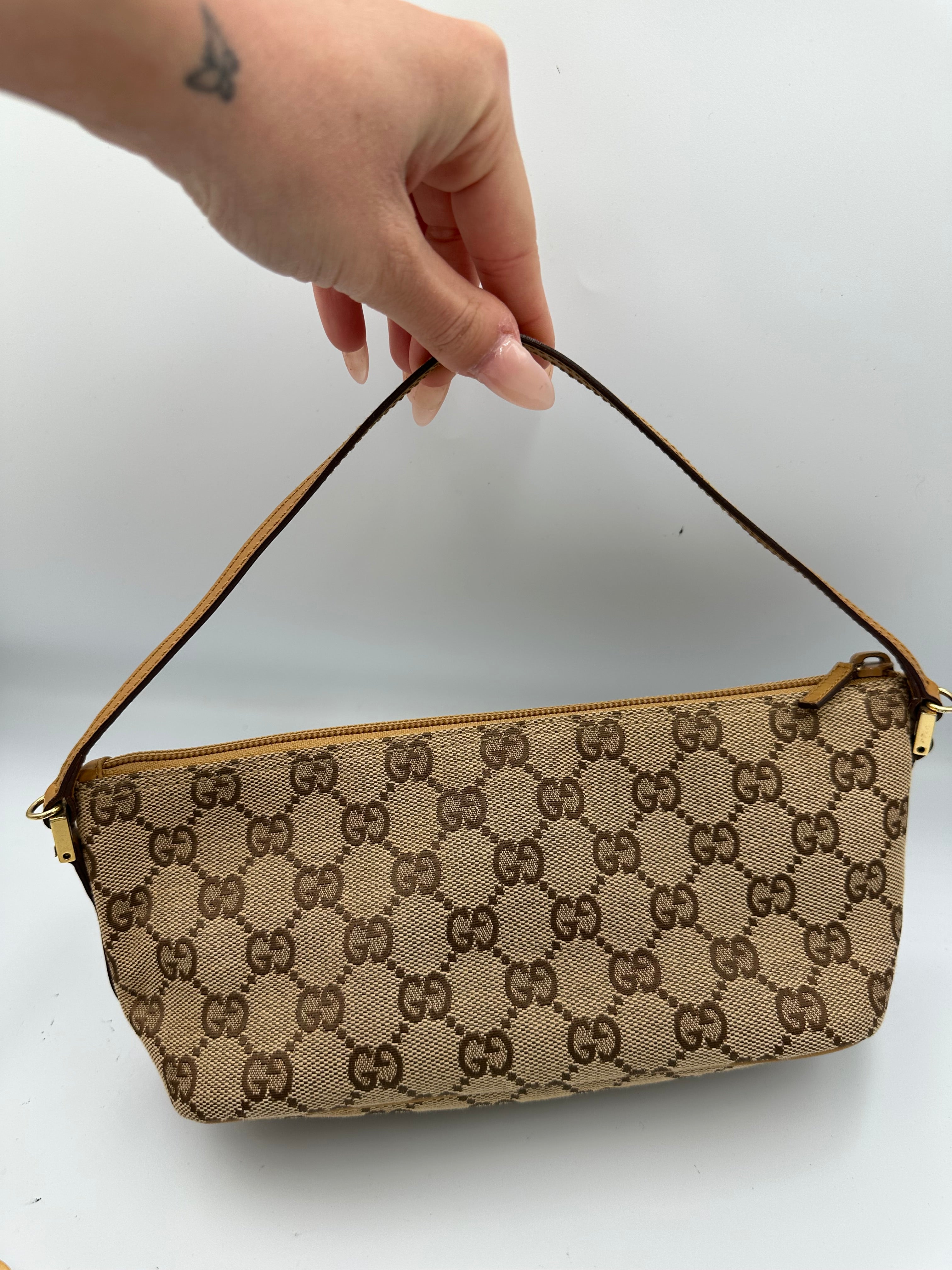Gucci boat monogram pochette