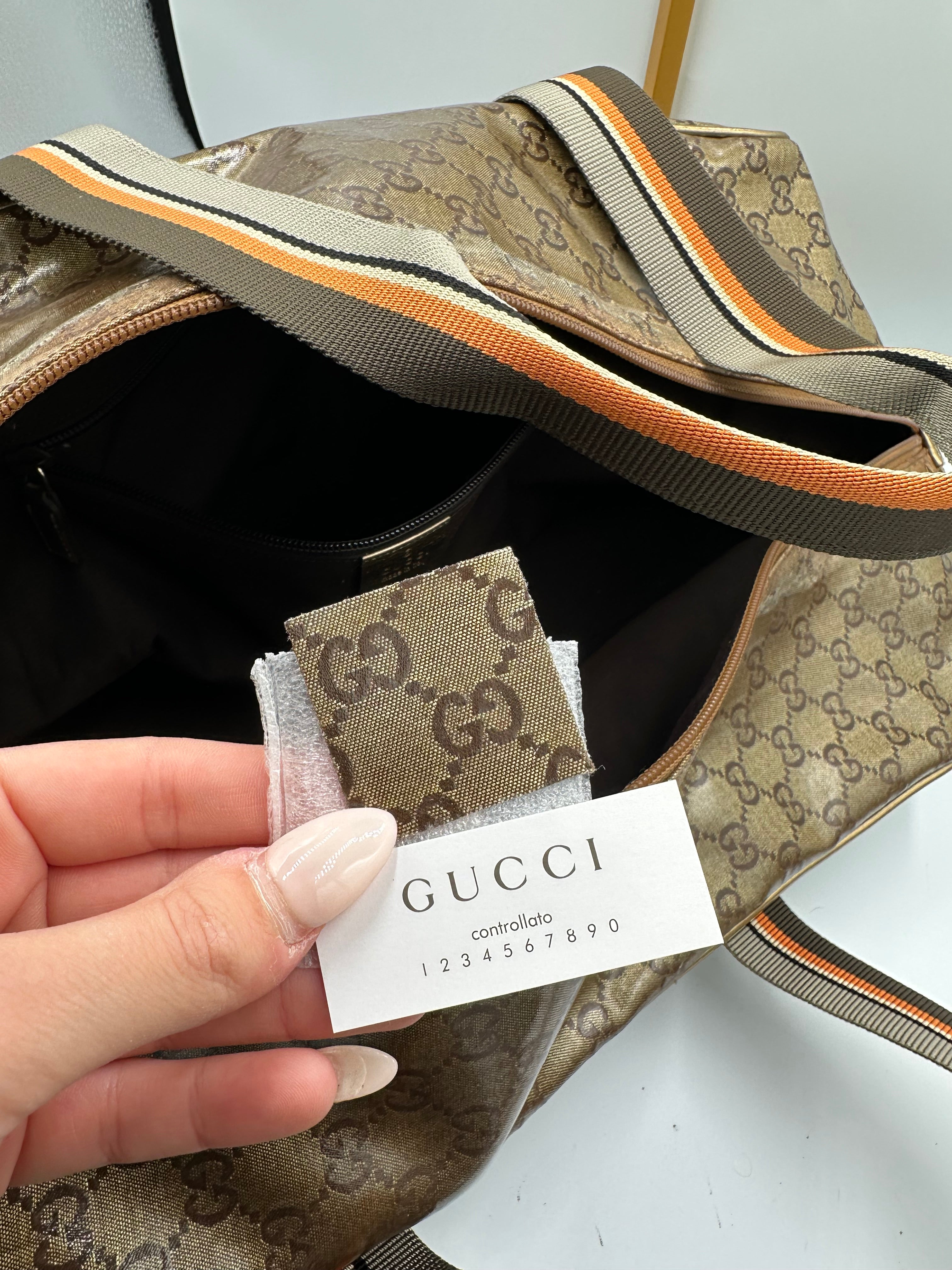 Rare 2000s Gucci bronze PVC metallic GG monogram pattern duffel bag