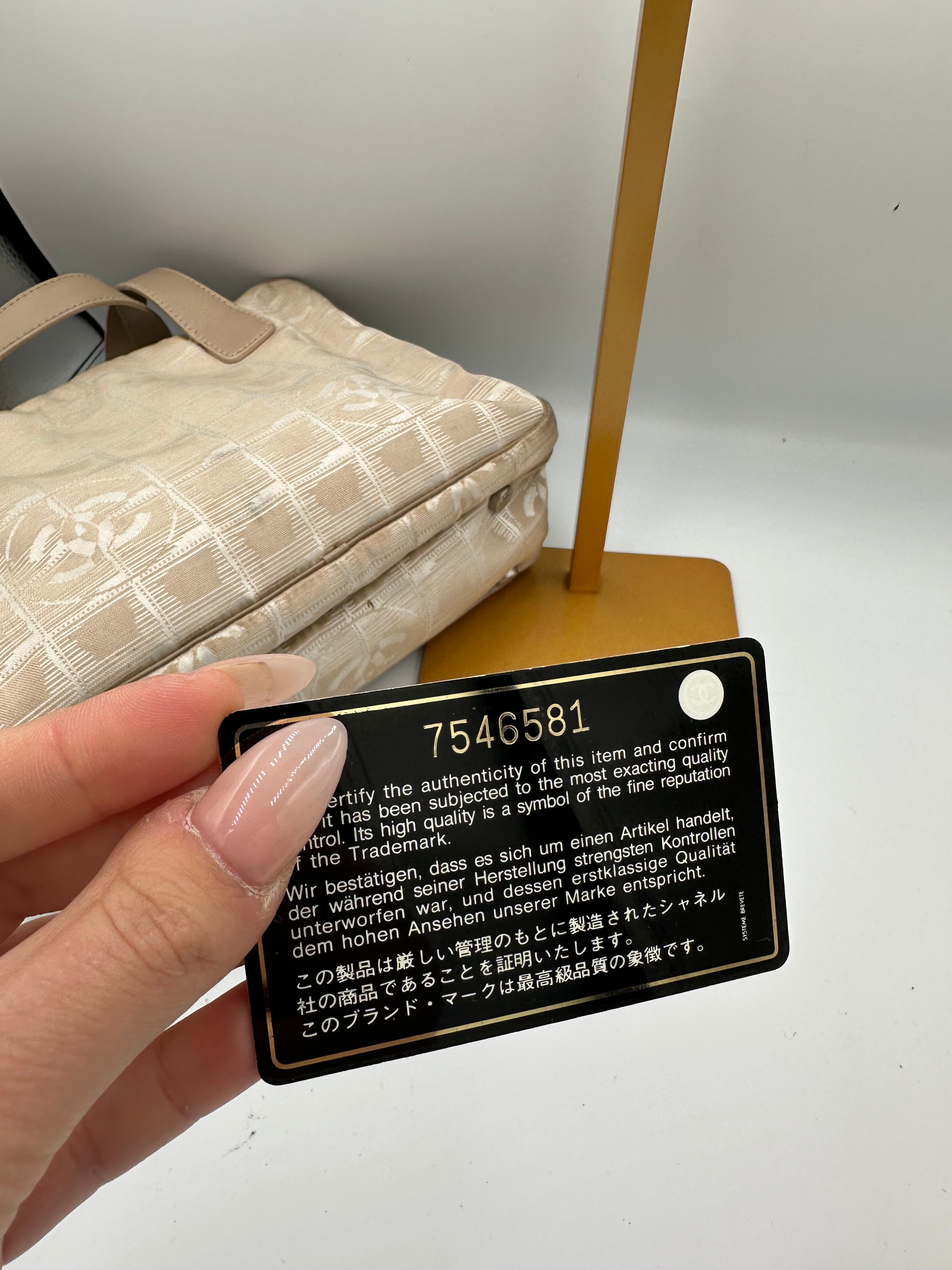Chanel 2004 Travel Line beige handbag