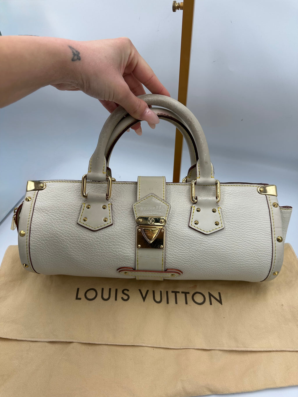 Louis Vuitton L'Epanoui PM handbag crafted from white Suhali goat leather