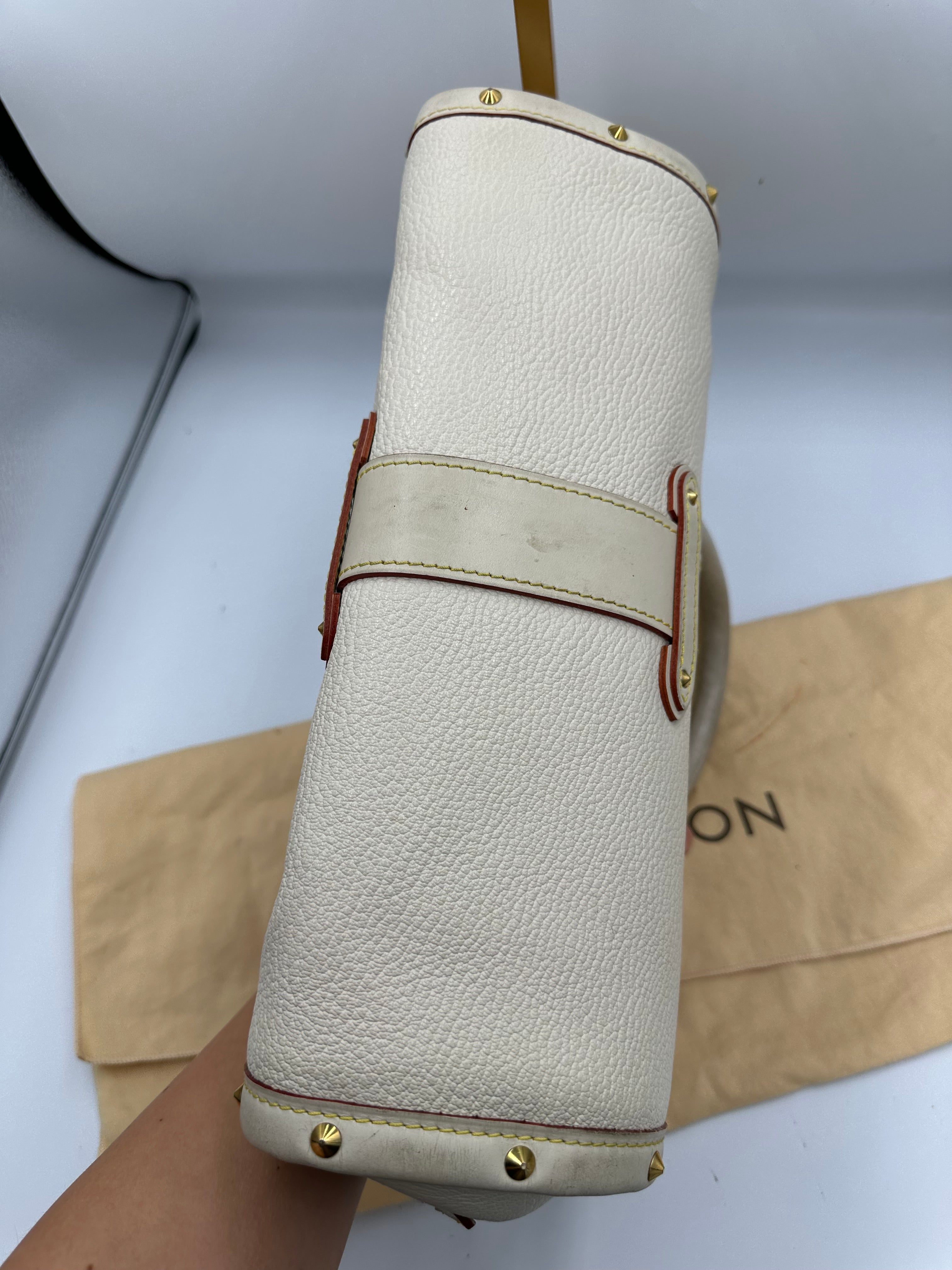 Louis Vuitton L'Epanoui PM handbag crafted from white Suhali goat leather