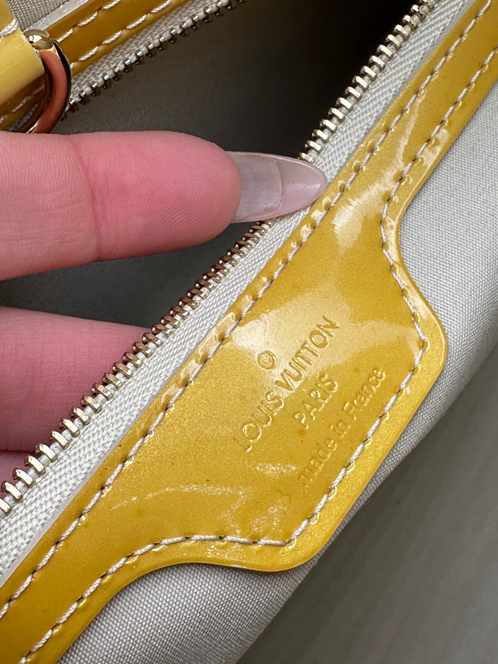 Louis Vuitton Wilshire PM handbag in yellow Monogram Vernis