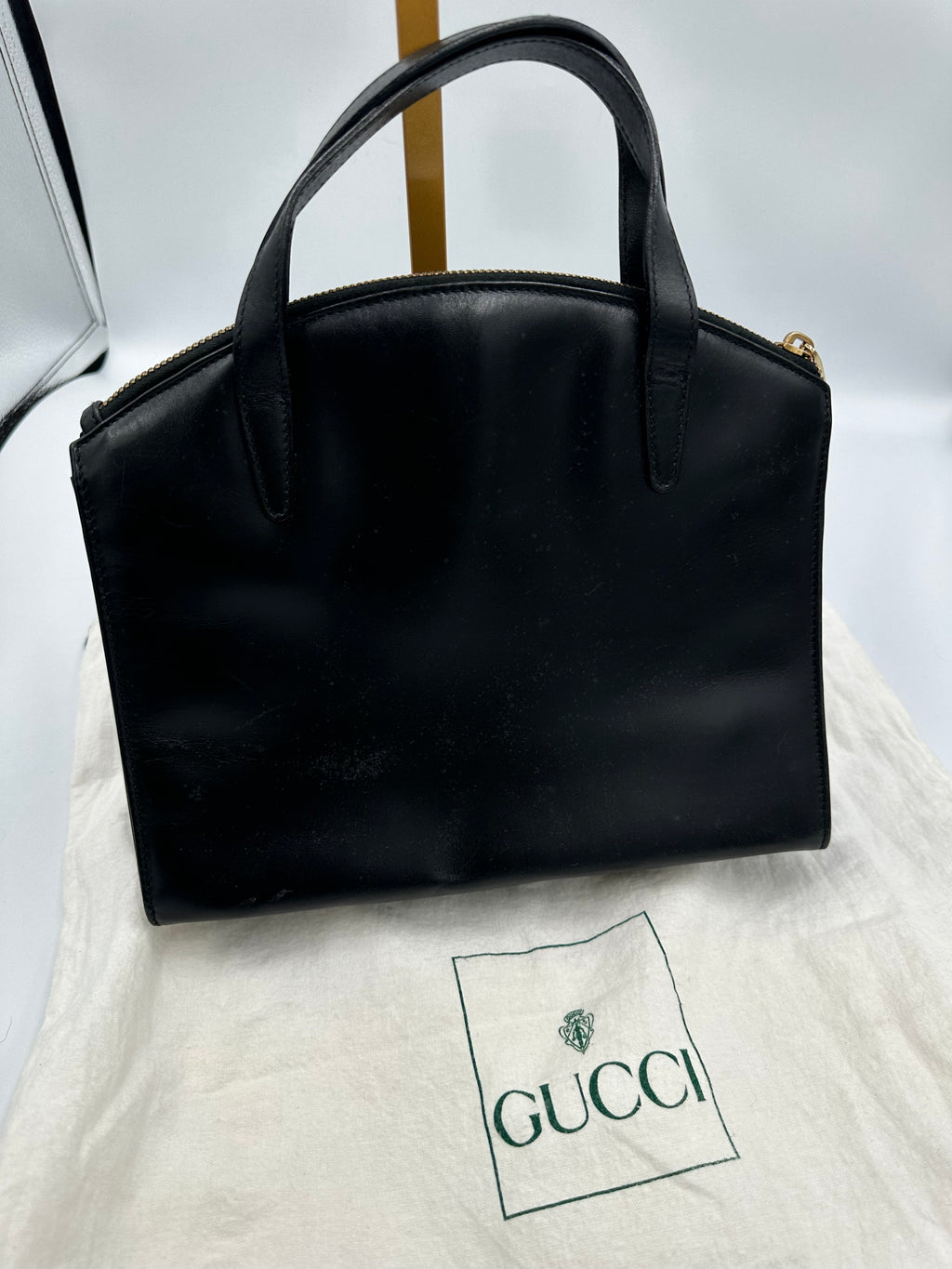 90’s Gucci Jackie black leather handbag with G gold hardware zip