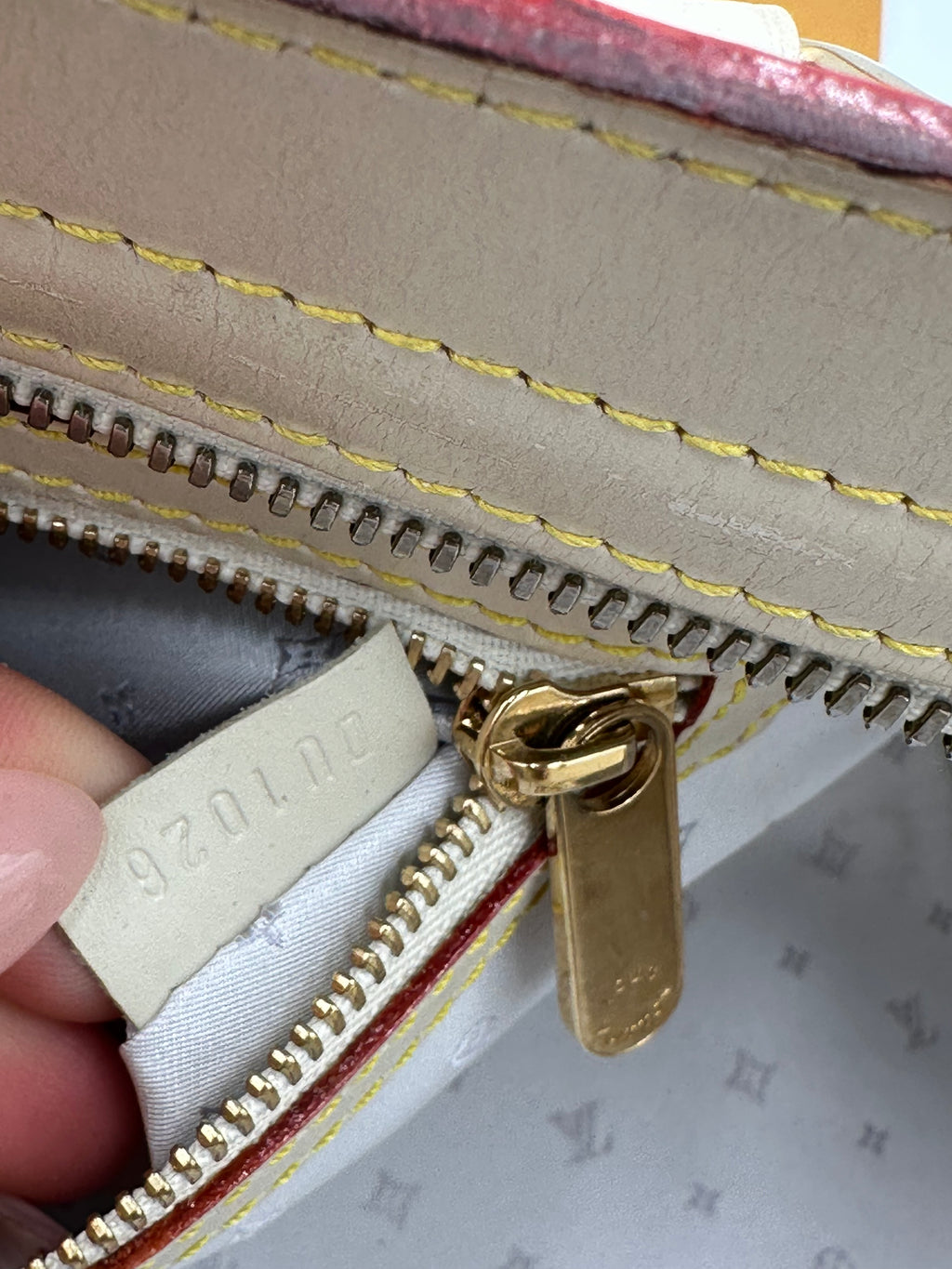 Louis Vuitton L'Epanoui PM handbag crafted from white Suhali goat leather