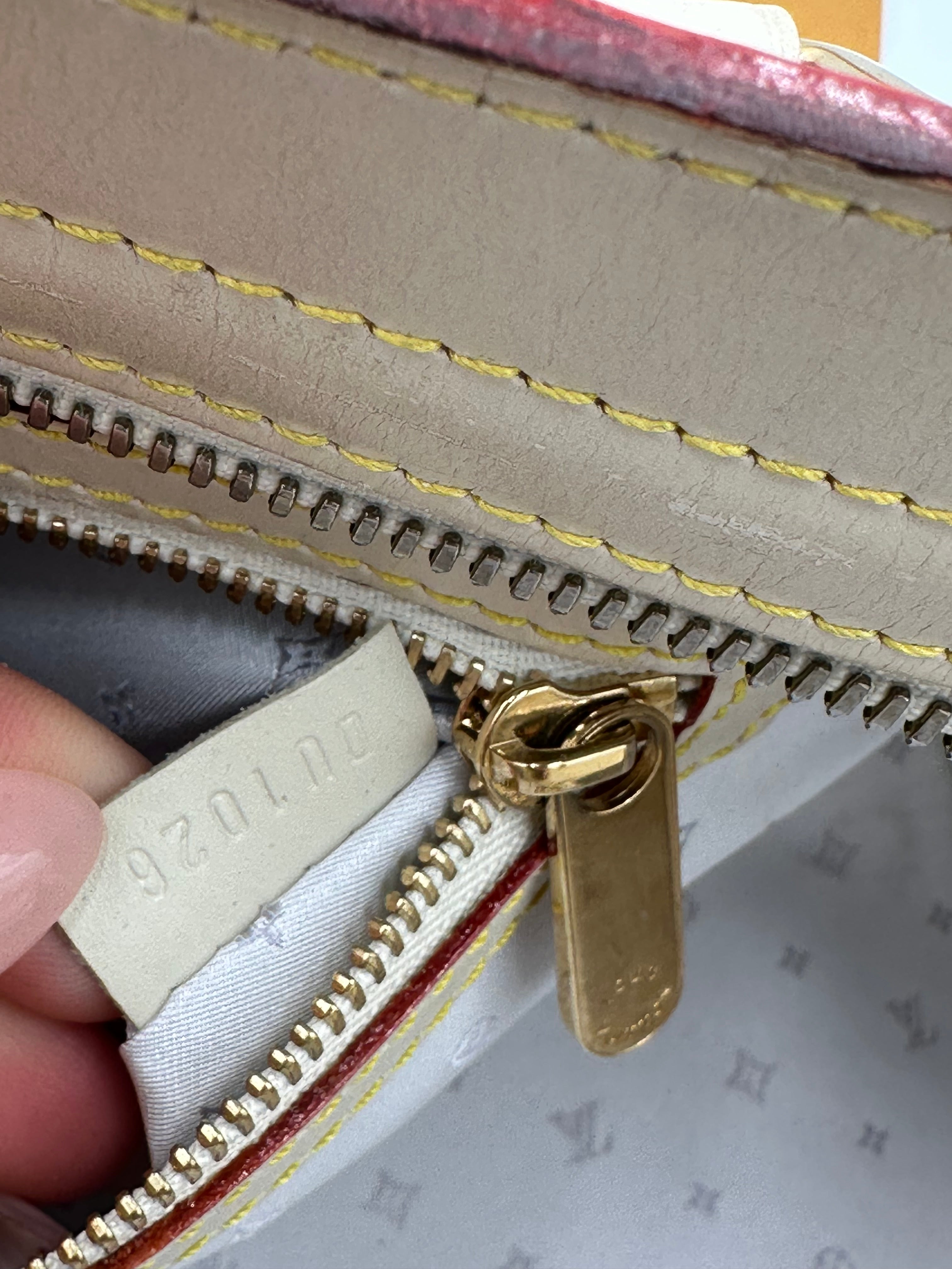 Louis Vuitton L'Epanoui PM handbag crafted from white Suhali goat leather