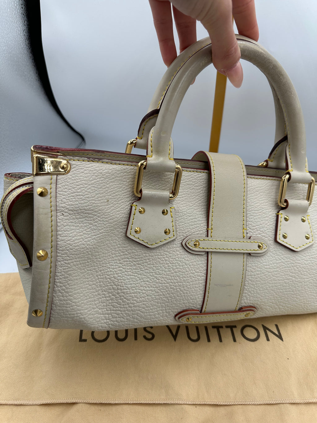 Louis Vuitton L'Epanoui PM handbag crafted from white Suhali goat leather