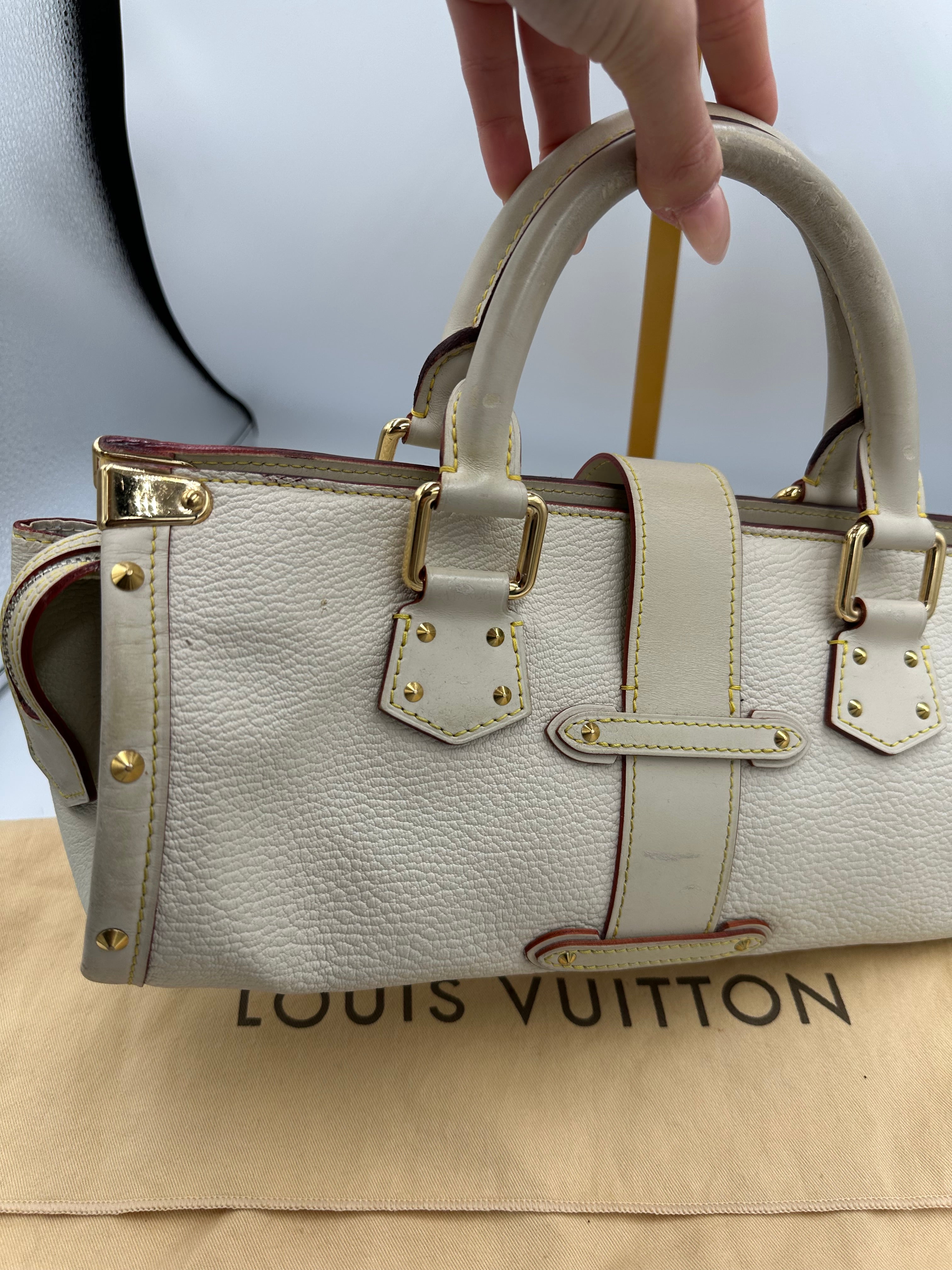 Louis Vuitton L'Epanoui PM handbag crafted from white Suhali goat leather