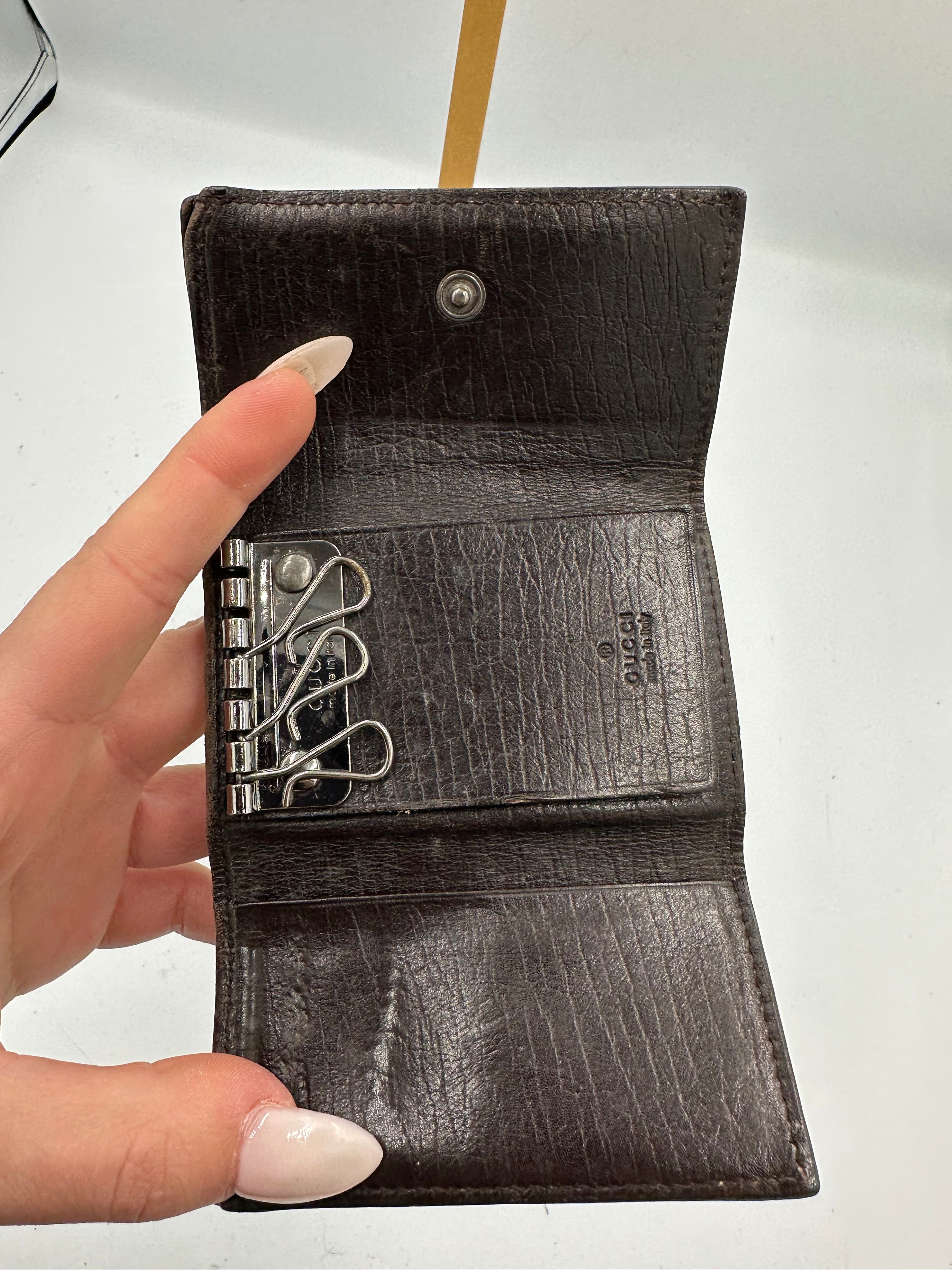 Gucci GG Supreme monogram leather key holder