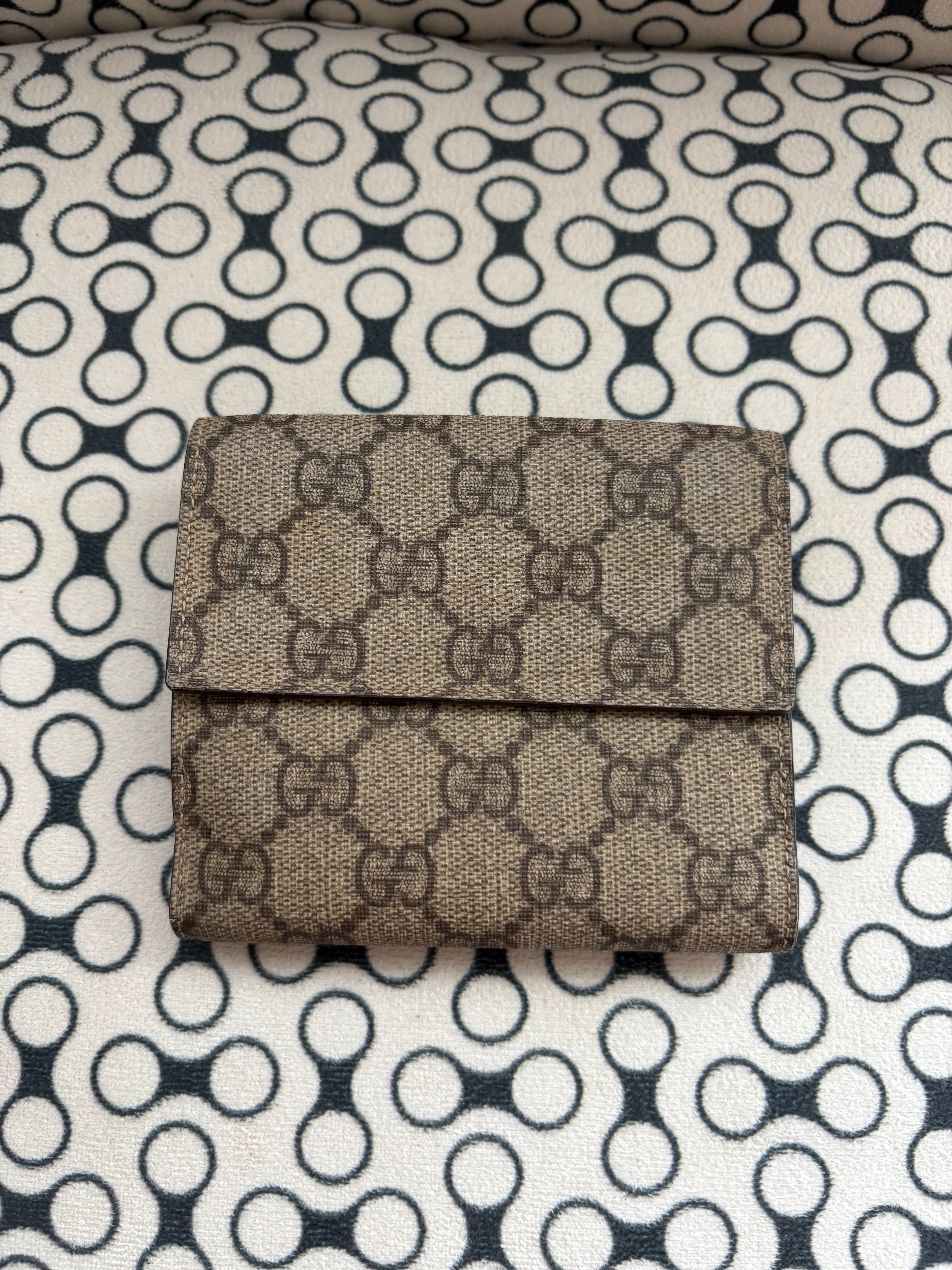 Gucci GG supreme trifold wallet
