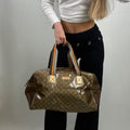 Rare 2000s Gucci bronze PVC metallic GG monogram pattern duffel bag