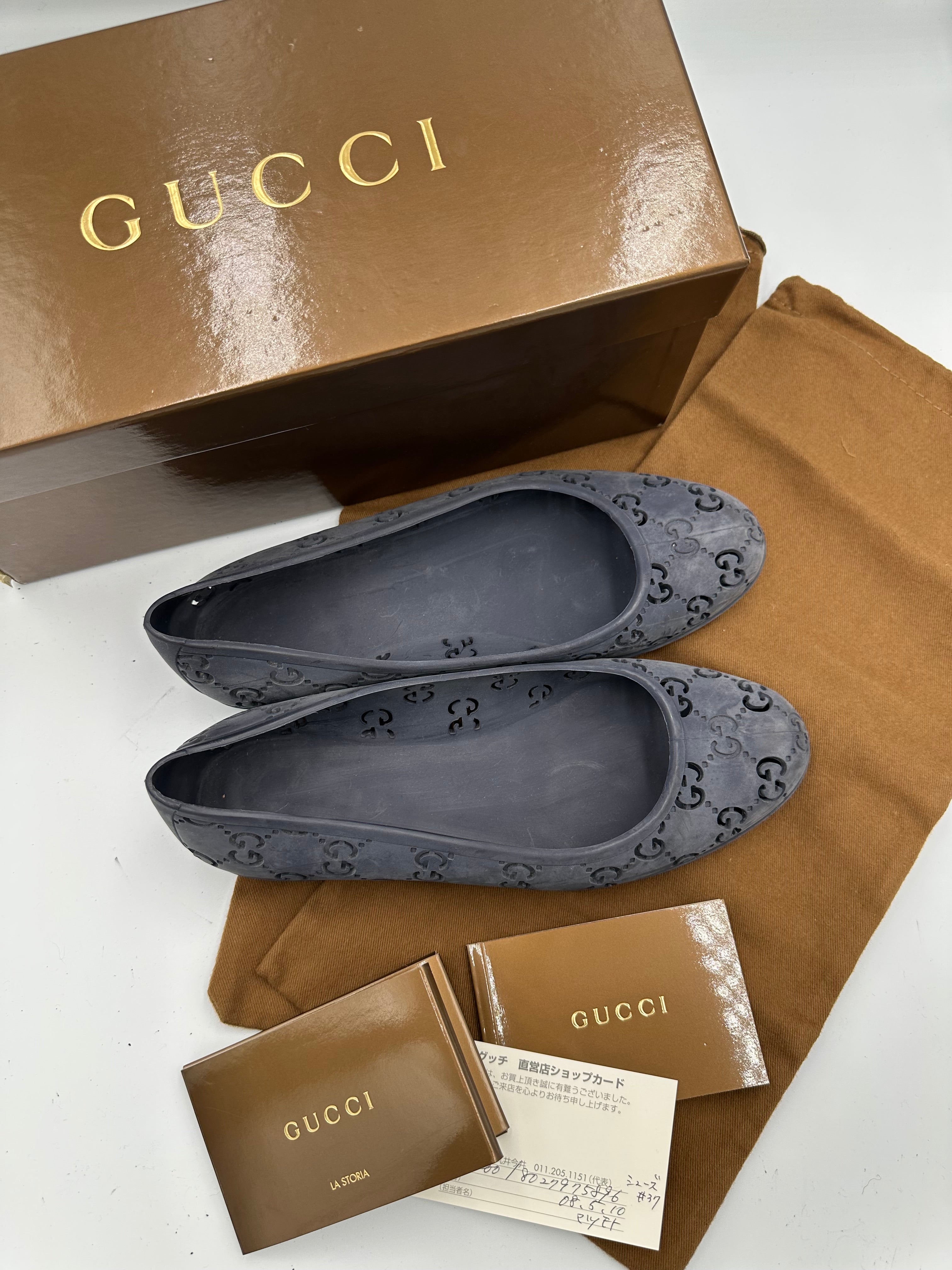 Gucci Monogram navy rubber flats