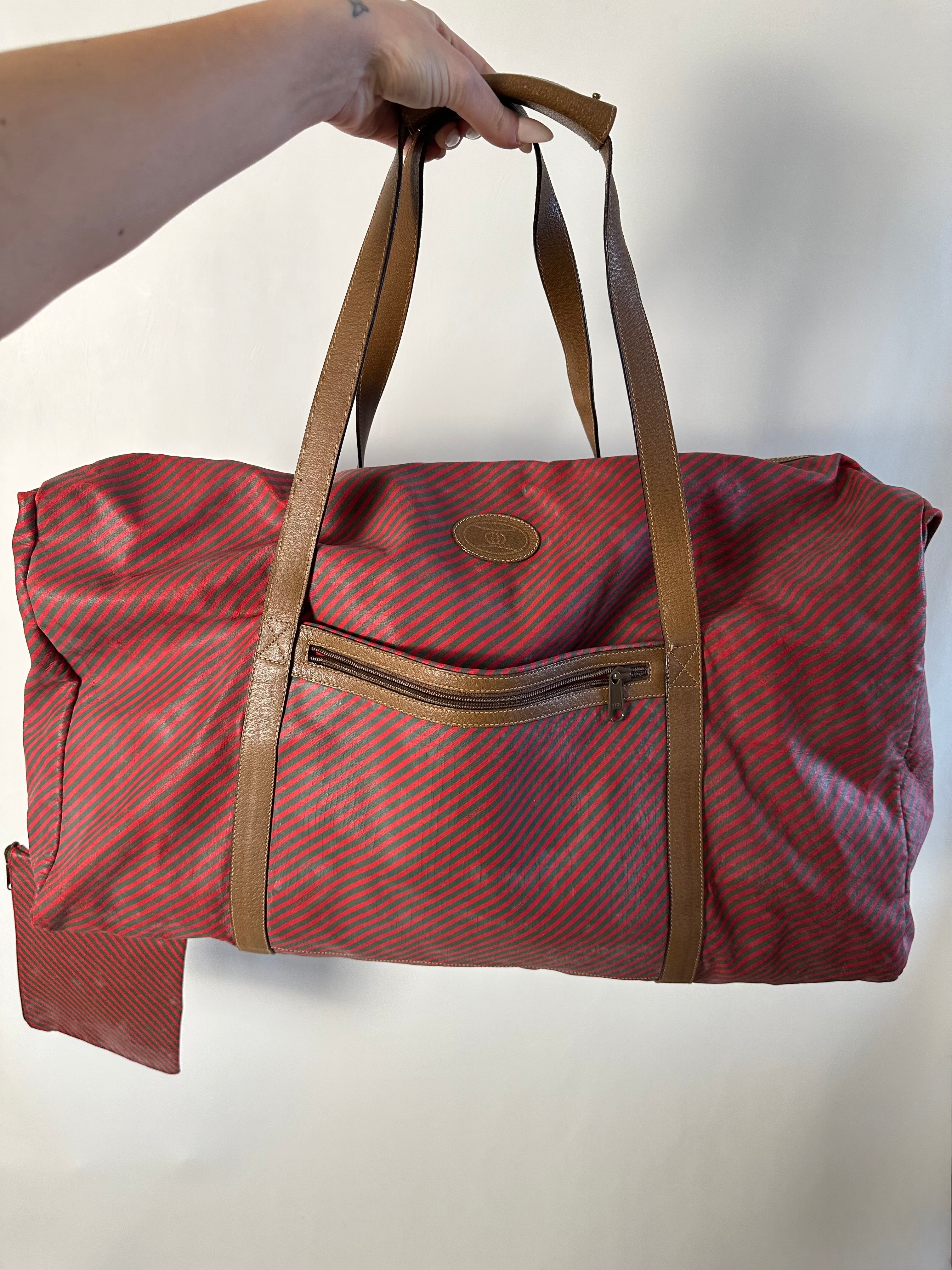 Vintage 90’s Gucci 48-hour Duffle large travel bag from the Rigate line with small pouch
