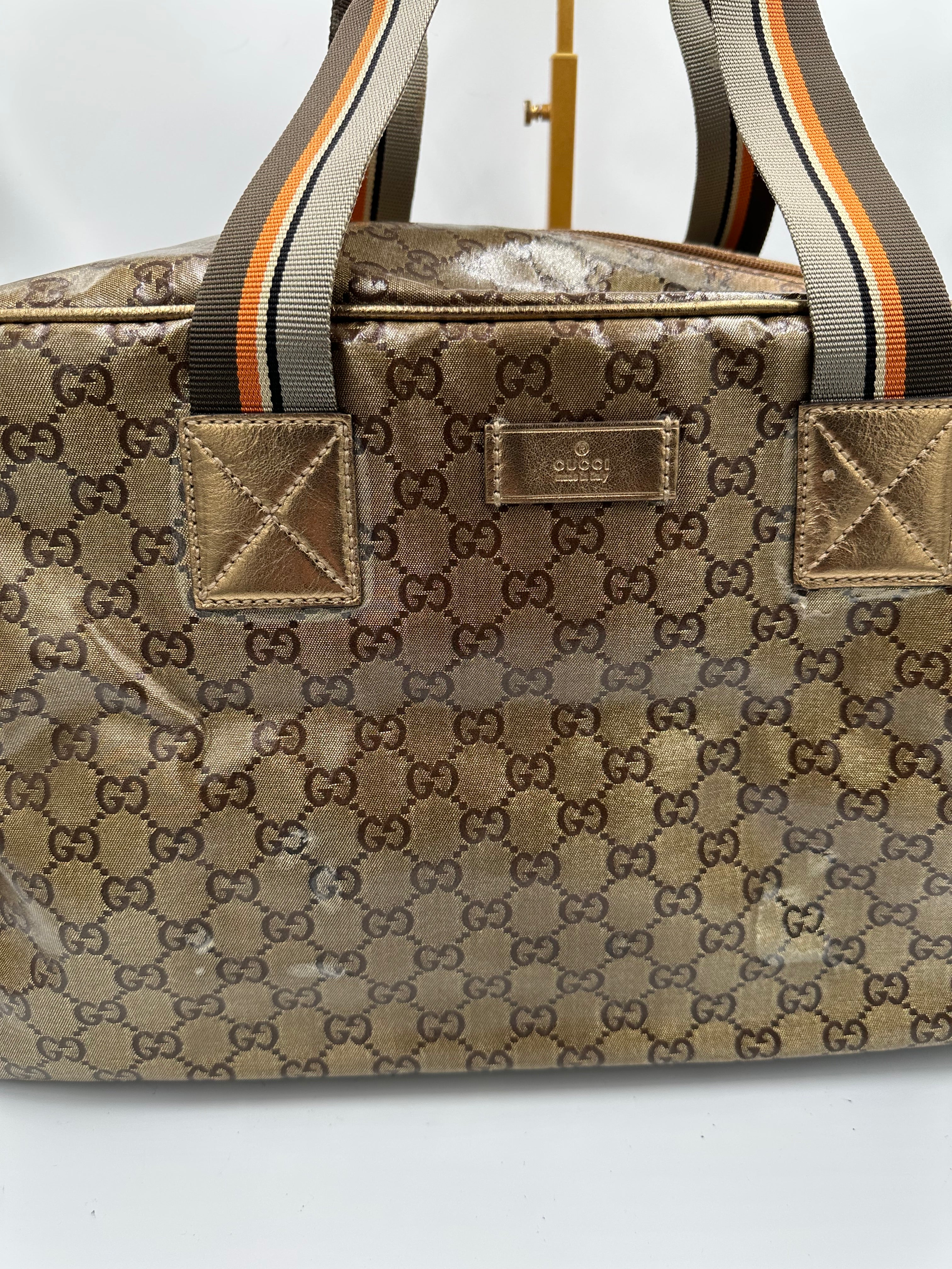 Rare 2000s Gucci bronze PVC metallic GG monogram pattern duffel bag
