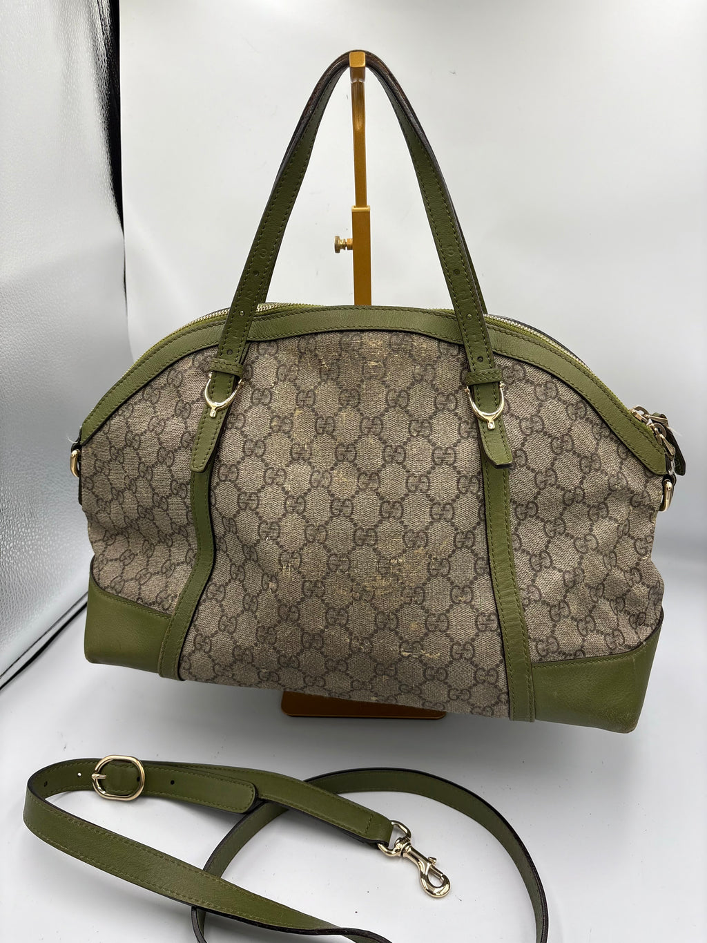Gucci Ophidia dome top handle bag featuring monogram GG supreme canvas