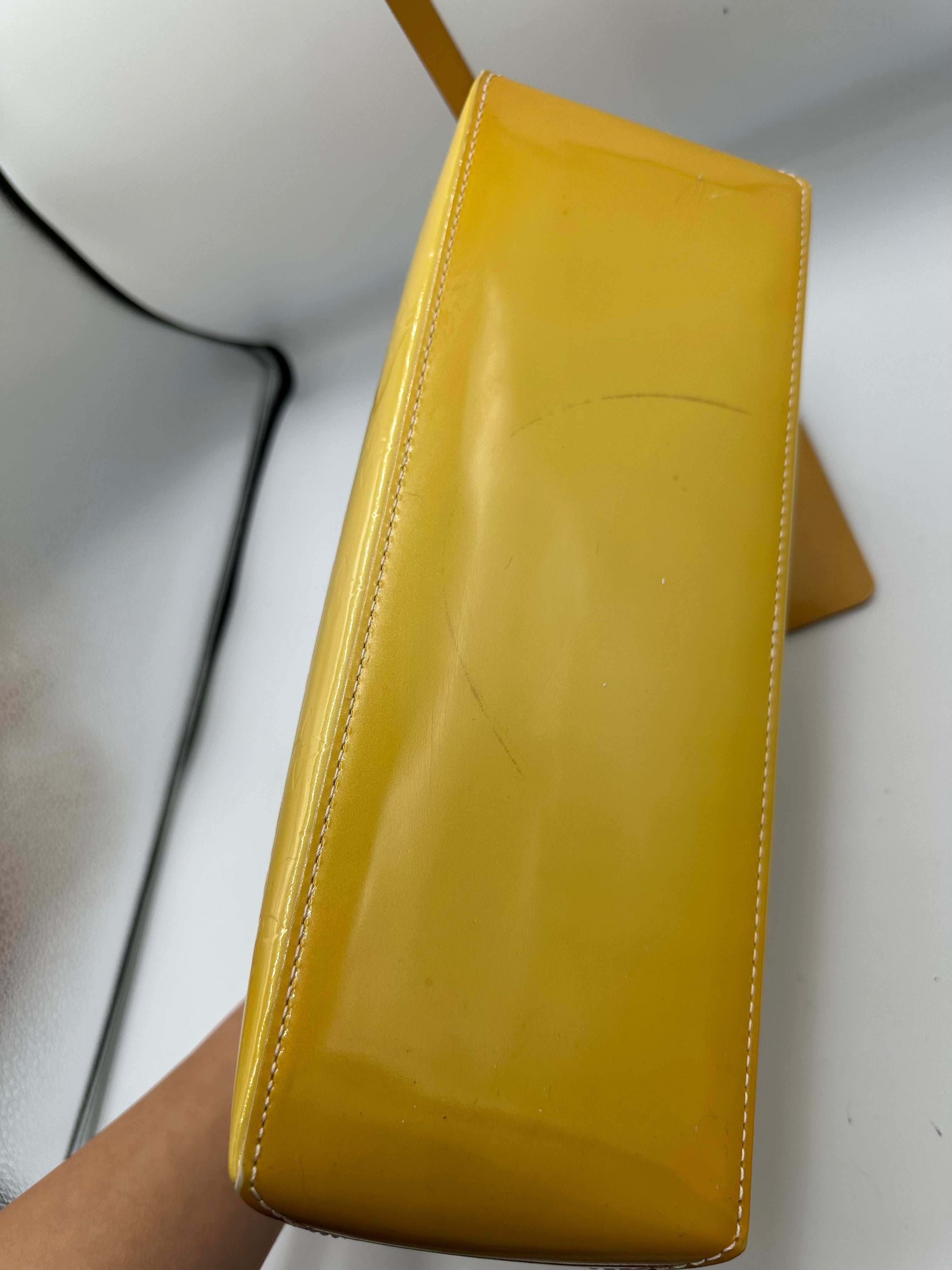 Louis Vuitton Wilshire PM handbag in yellow Monogram Vernis