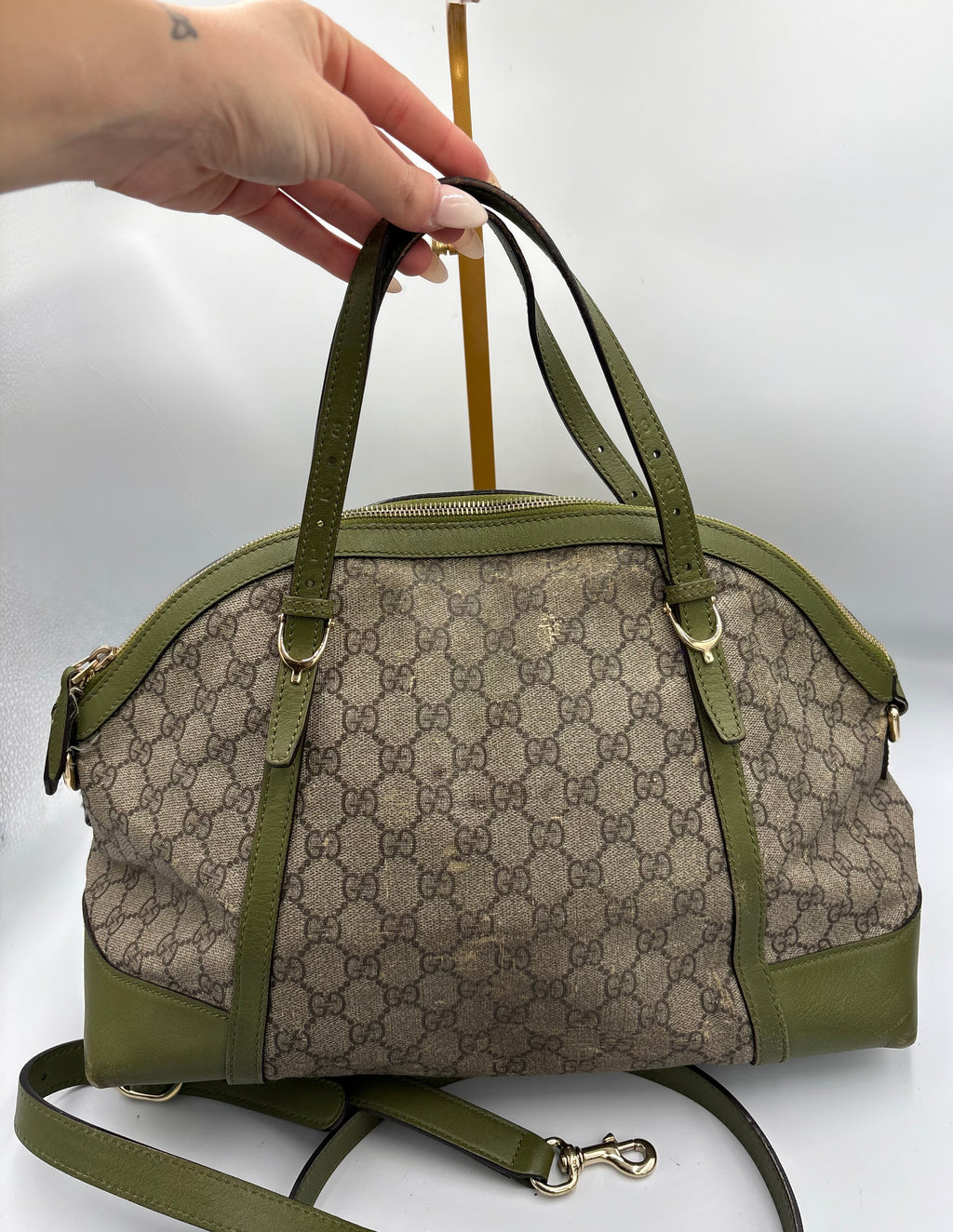 Gucci Ophidia dome top handle bag featuring monogram GG supreme canvas