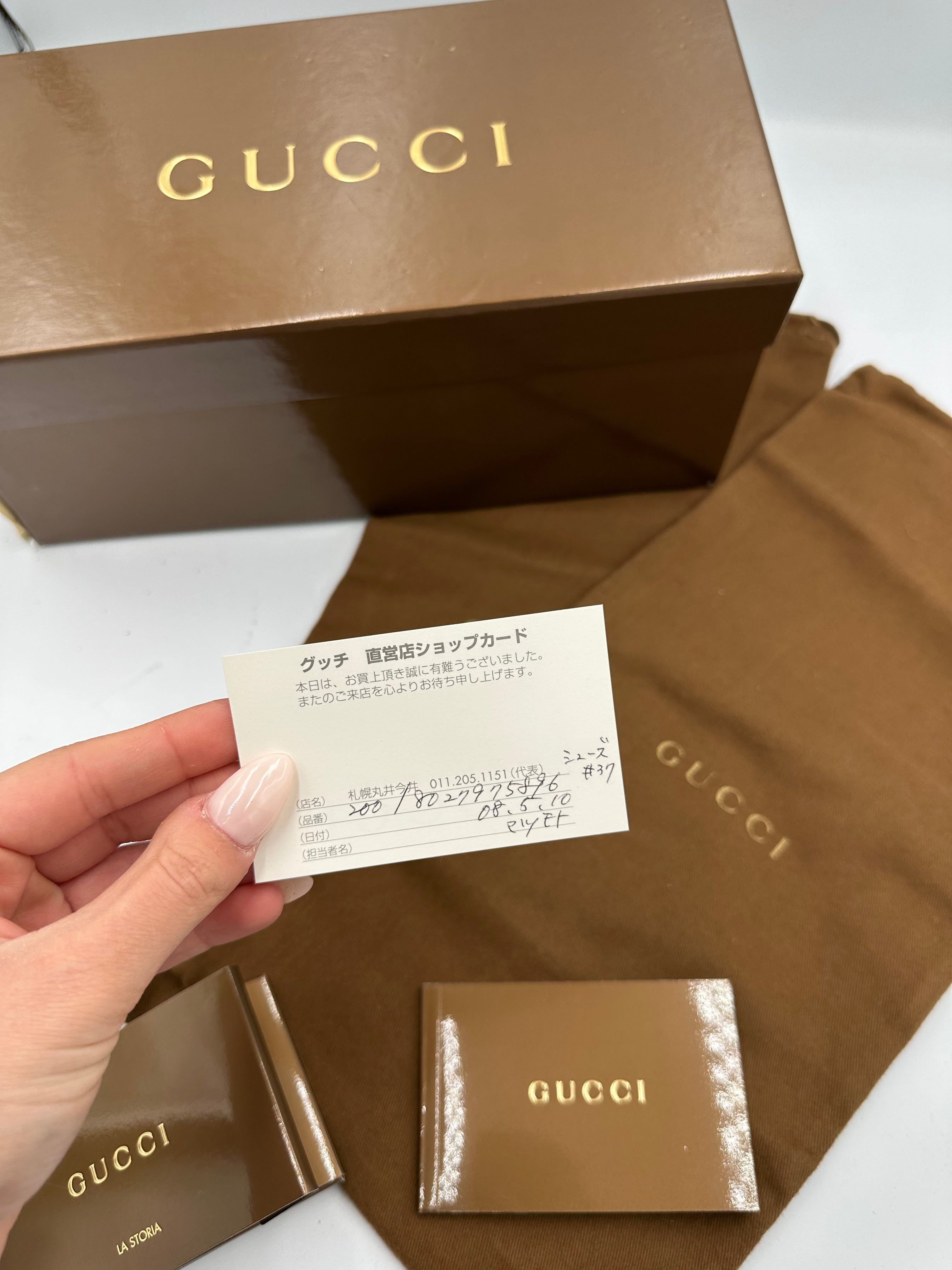 Gucci Monogram navy rubber flats