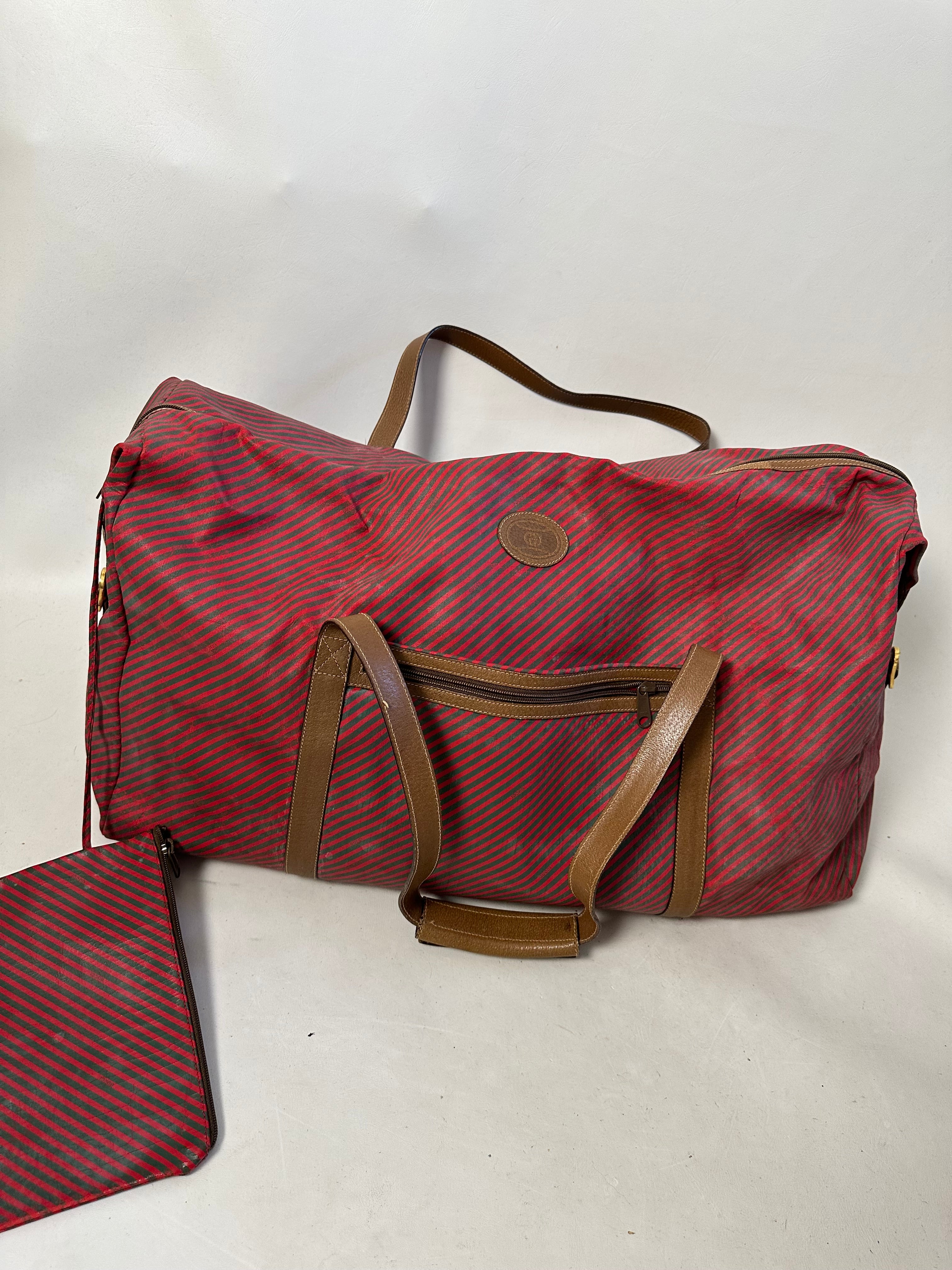 Vintage 90’s Gucci 48-hour Duffle large travel bag from the Rigate line with small pouch