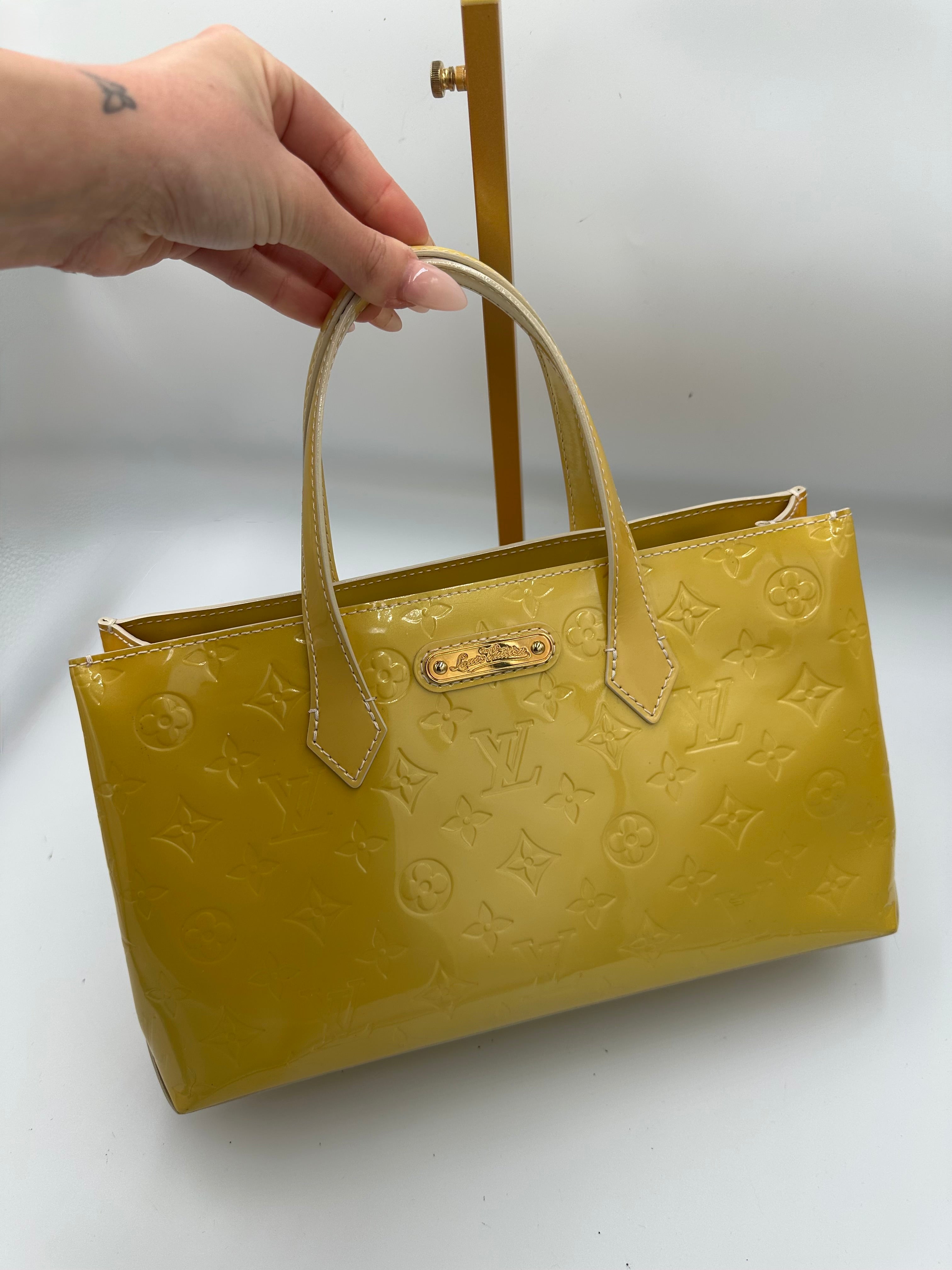 Louis Vuitton Wilshire PM handbag in yellow Monogram Vernis