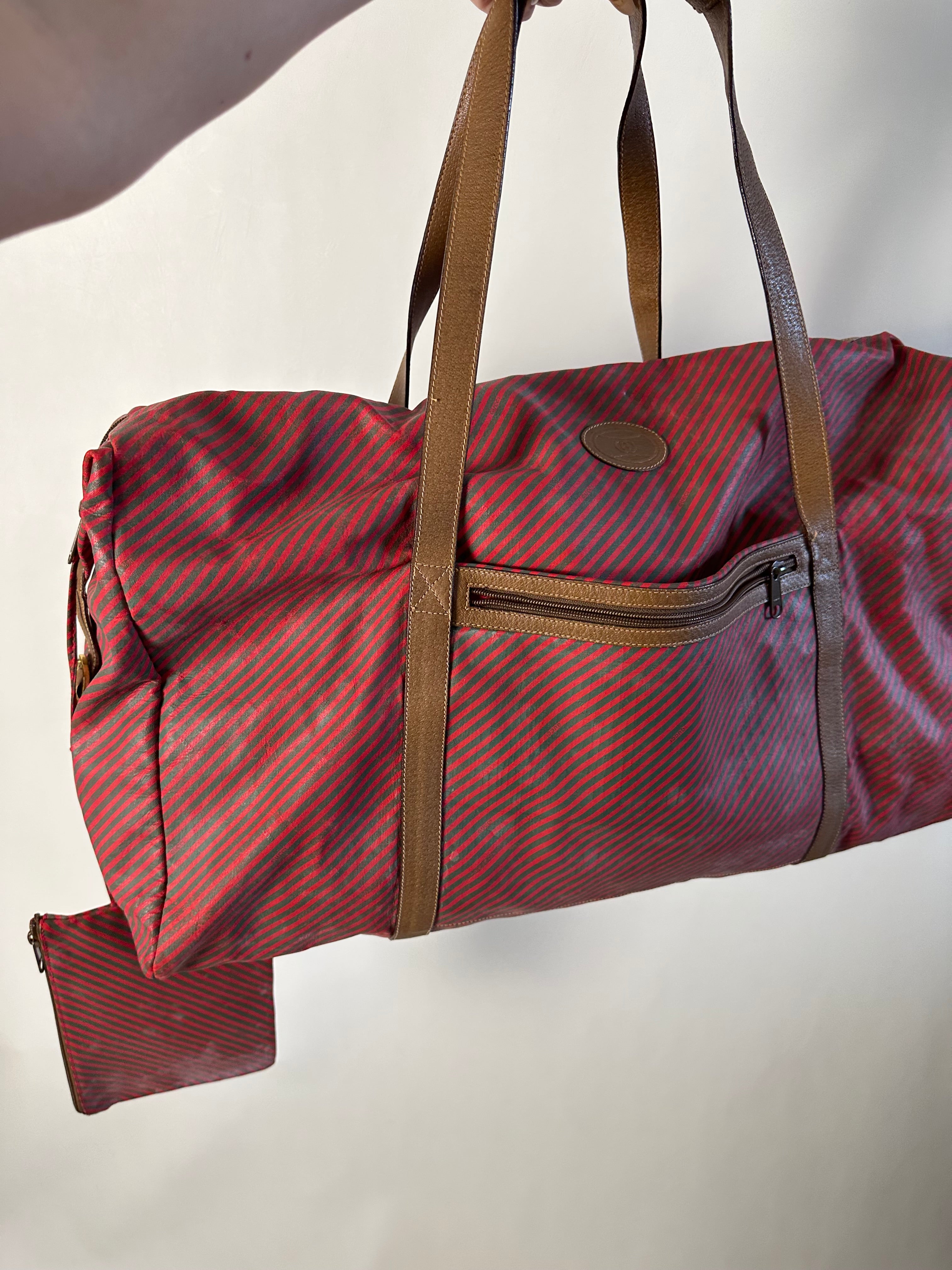 Vintage 90’s Gucci 48-hour Duffle large travel bag from the Rigate line with small pouch