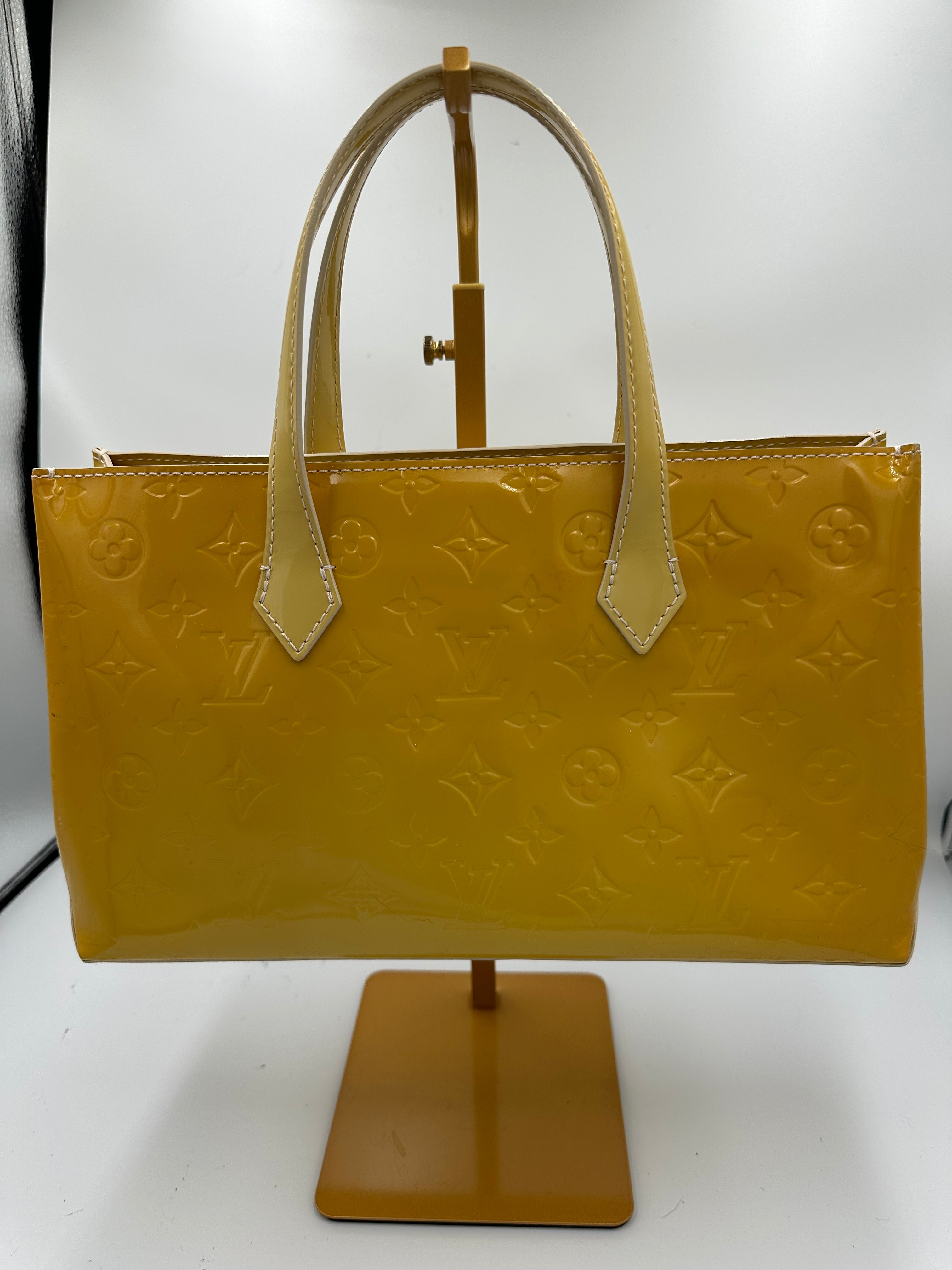 Louis Vuitton Wilshire PM handbag in yellow Monogram Vernis