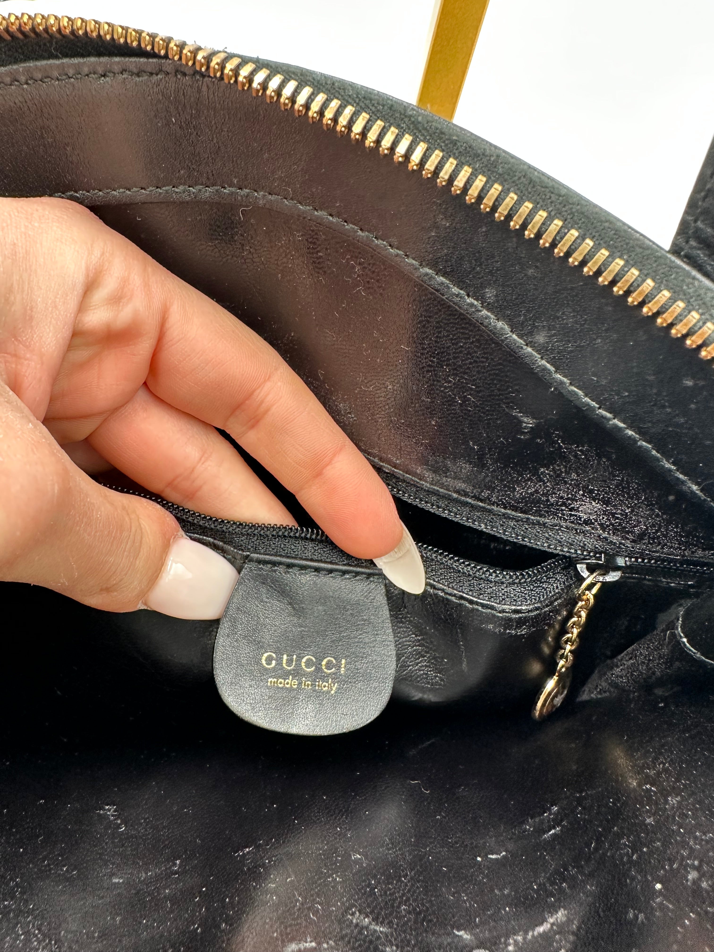 90’s Gucci Jackie black leather handbag with G gold hardware zip