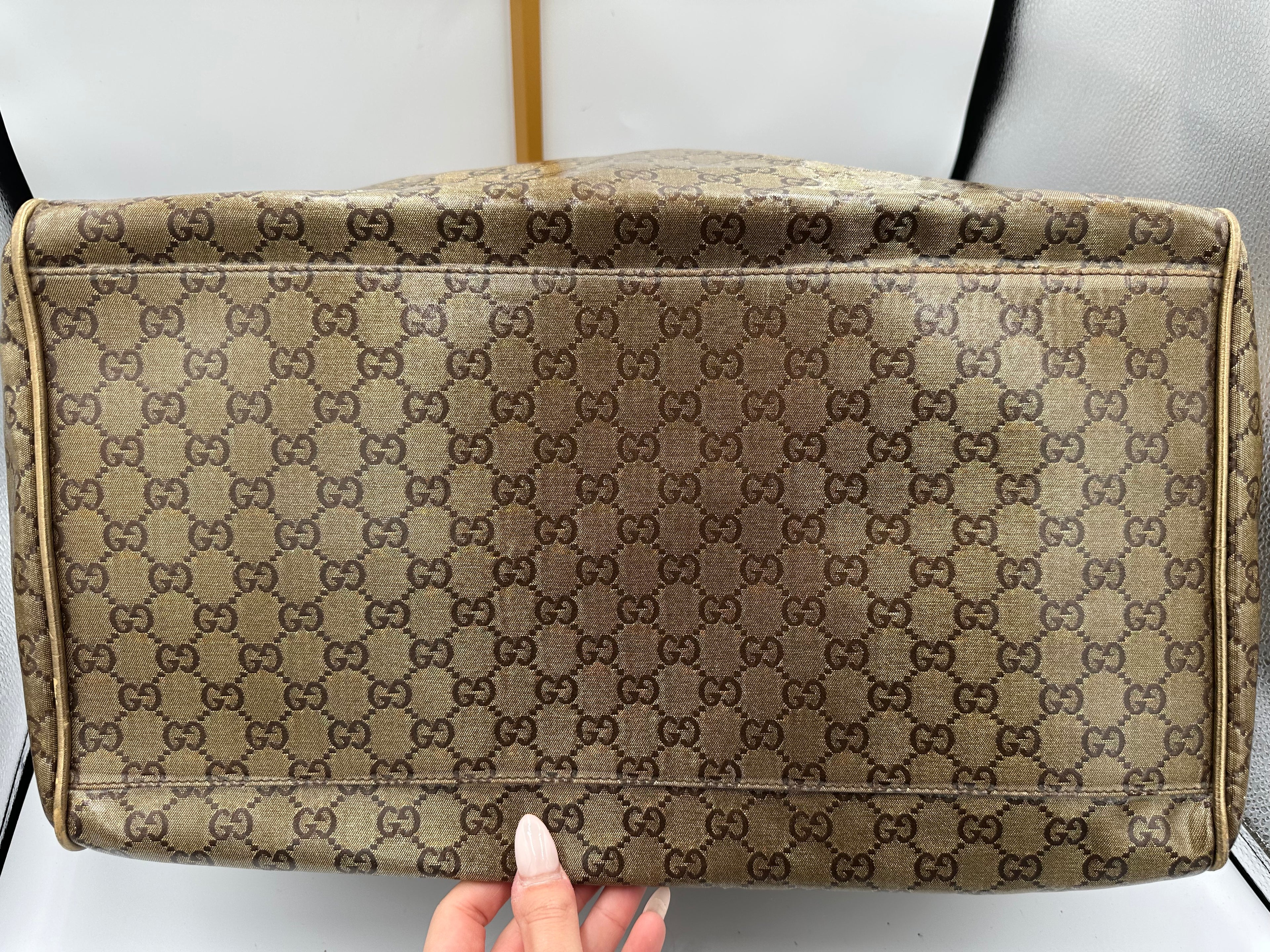 Rare 2000s Gucci bronze PVC metallic GG monogram pattern duffel bag