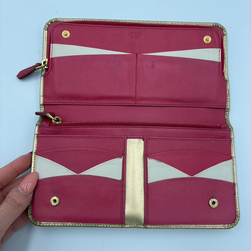 Gold Prada trifold wallet/ purse with pink interior