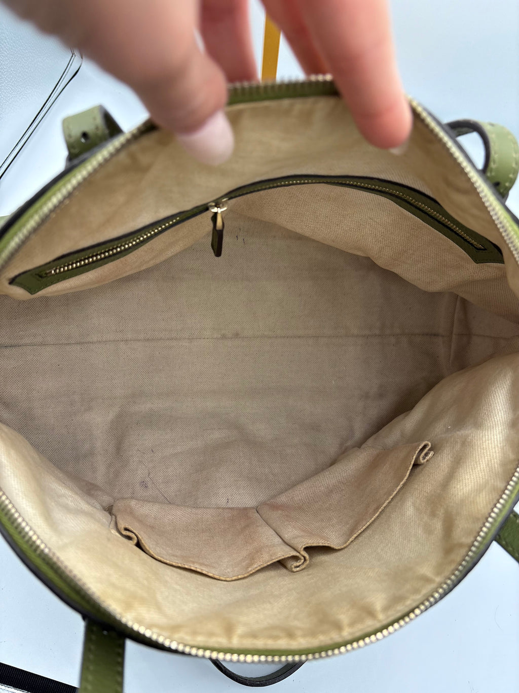 Gucci Ophidia dome top handle bag featuring monogram GG supreme canvas