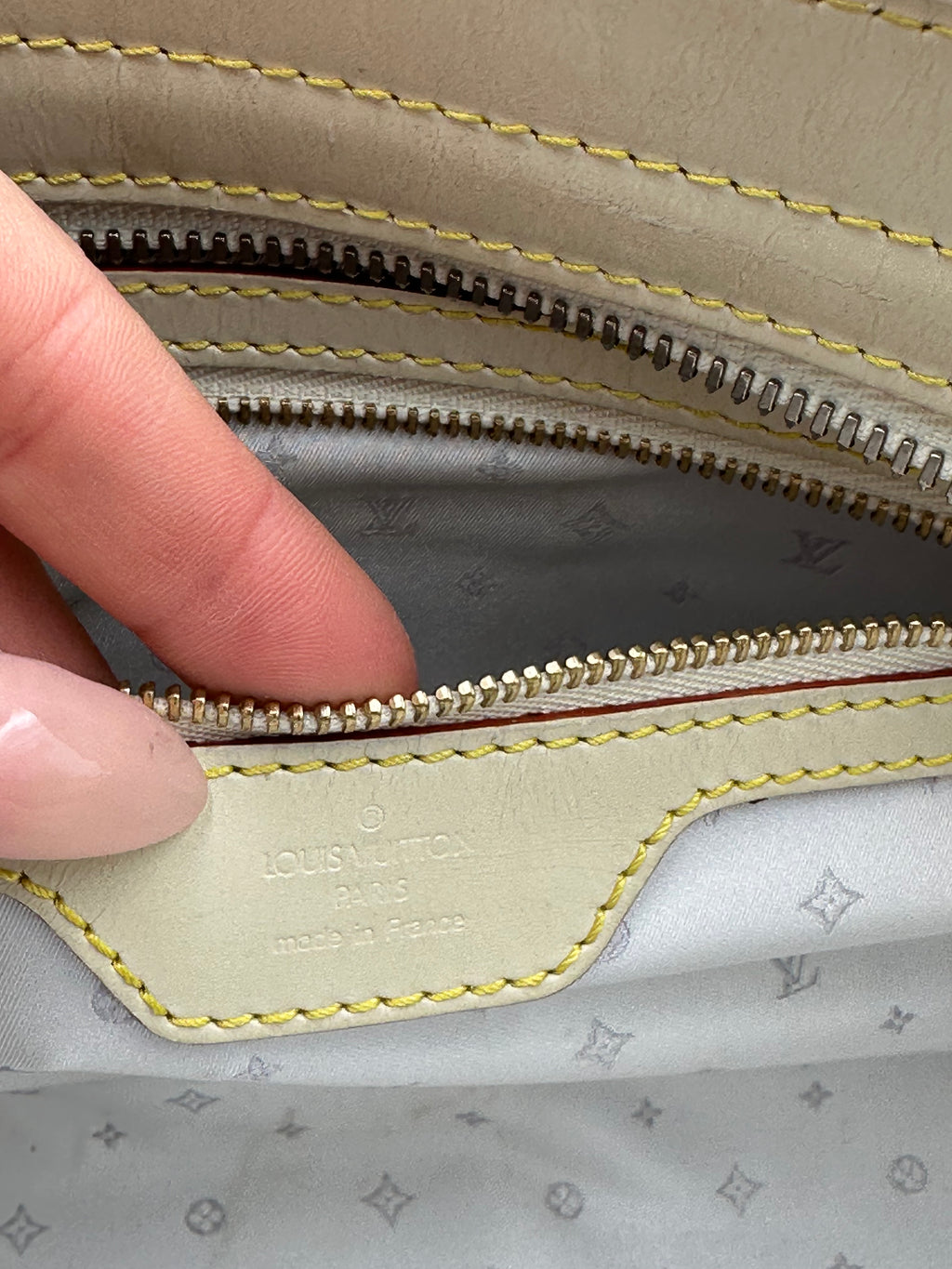 Louis Vuitton L'Epanoui PM handbag crafted from white Suhali goat leather