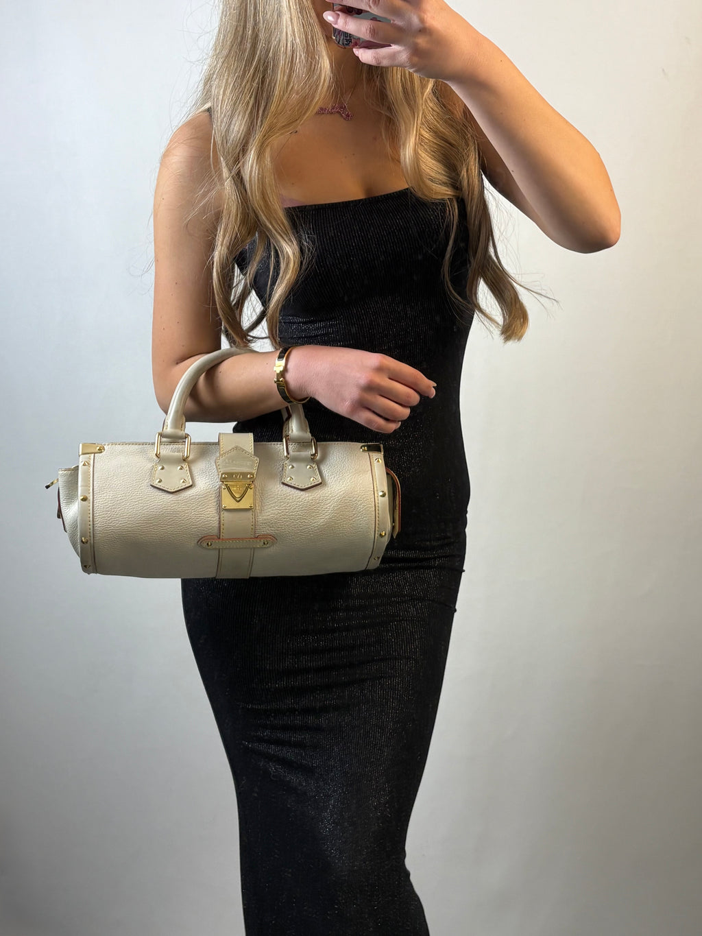 Louis Vuitton L'Epanoui PM handbag crafted from white Suhali goat leather