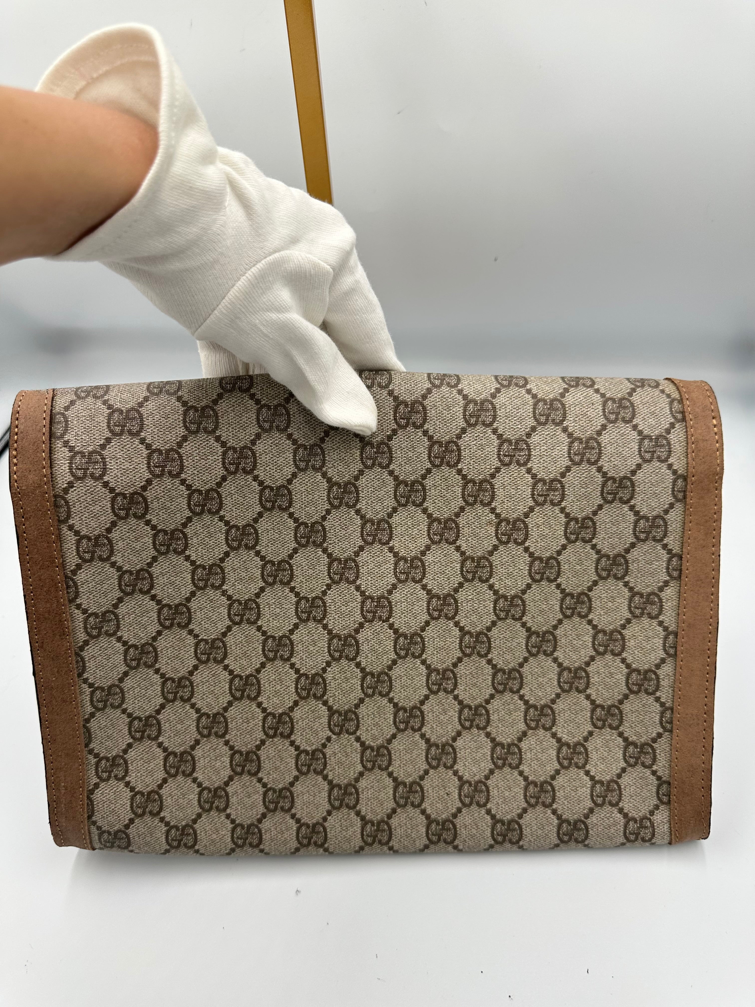 1970s Gucci brown GG leather monogram portfolio clutch bag