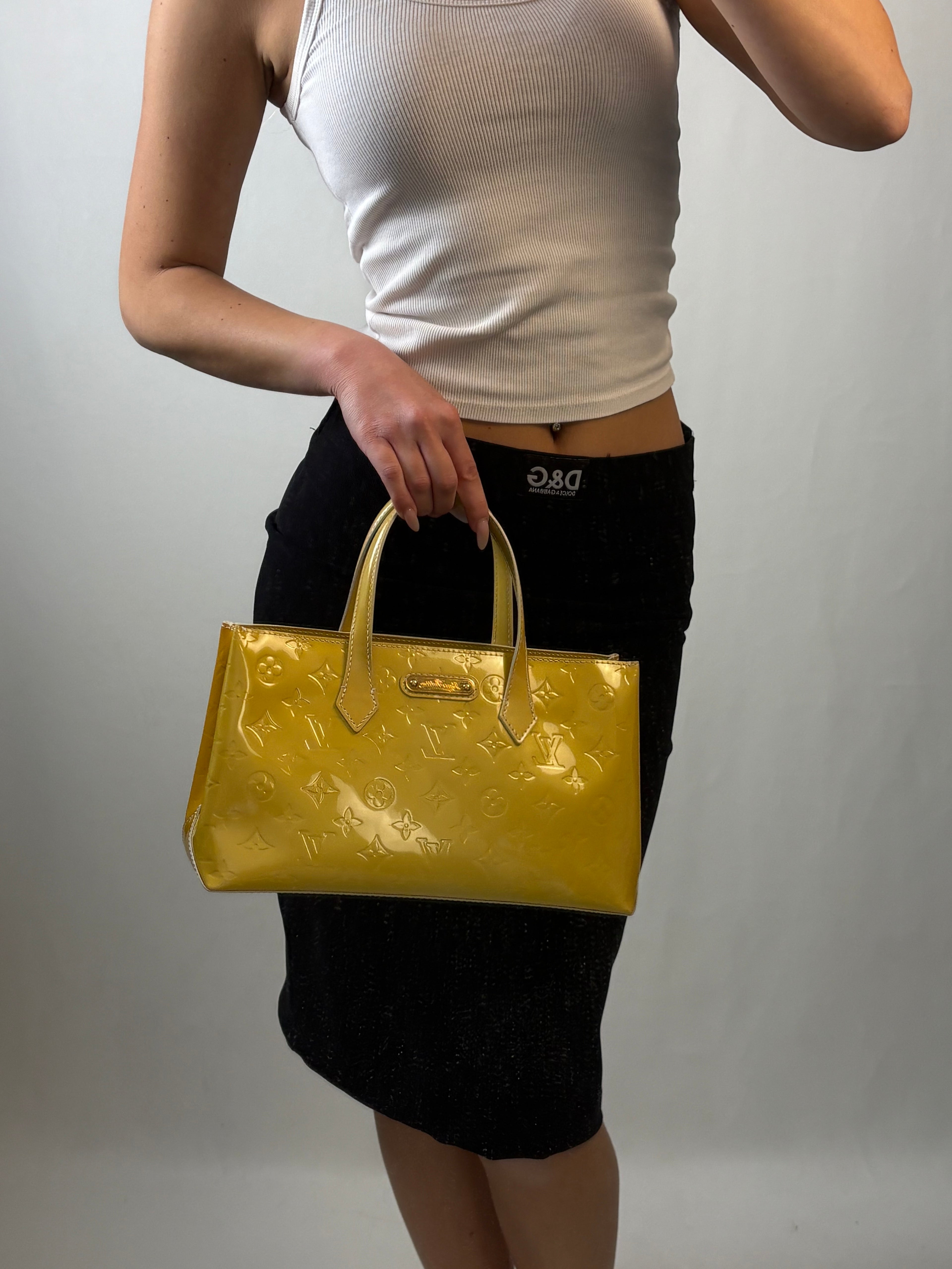 Louis Vuitton Wilshire PM handbag in yellow Monogram Vernis