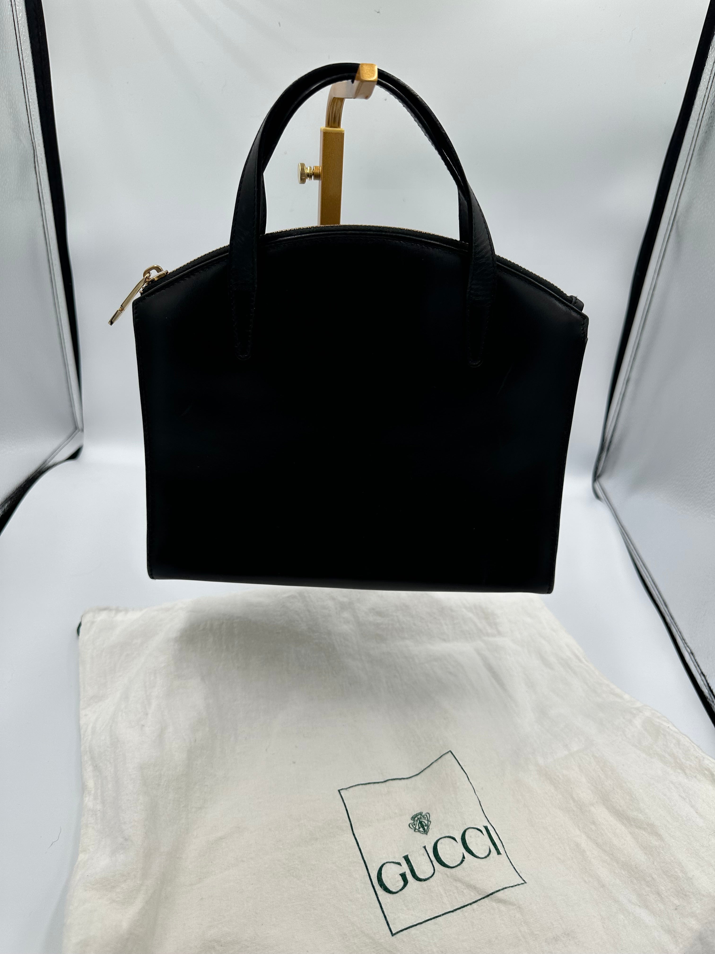 90’s Gucci Jackie black leather handbag with G gold hardware zip