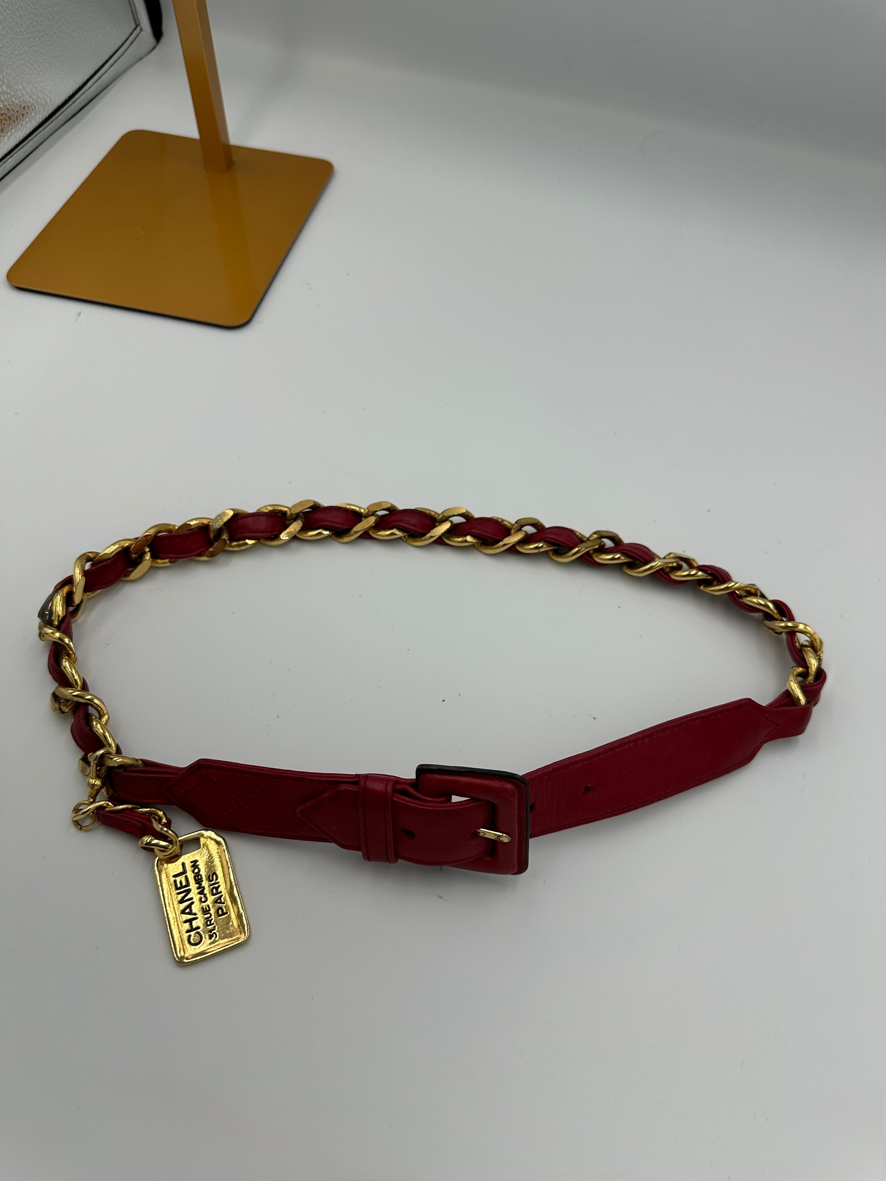 Rare 1990s Chanel red leather “ 31 Rue Cambon Paris chain belt