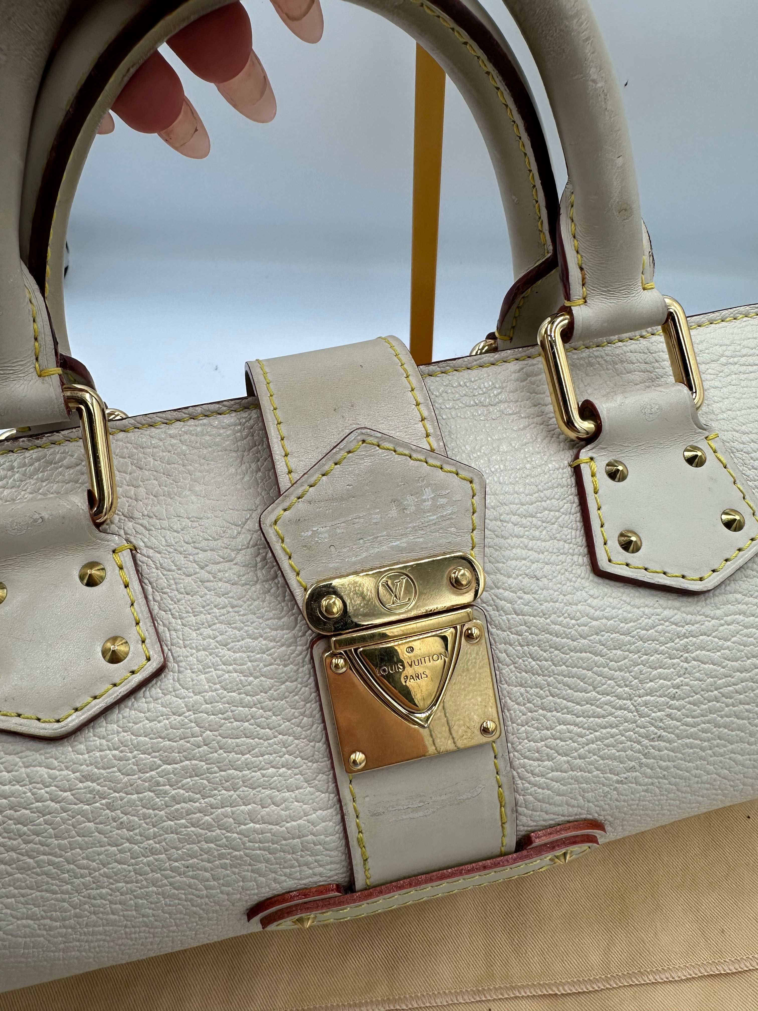 Louis Vuitton L'Epanoui PM handbag crafted from white Suhali goat leather