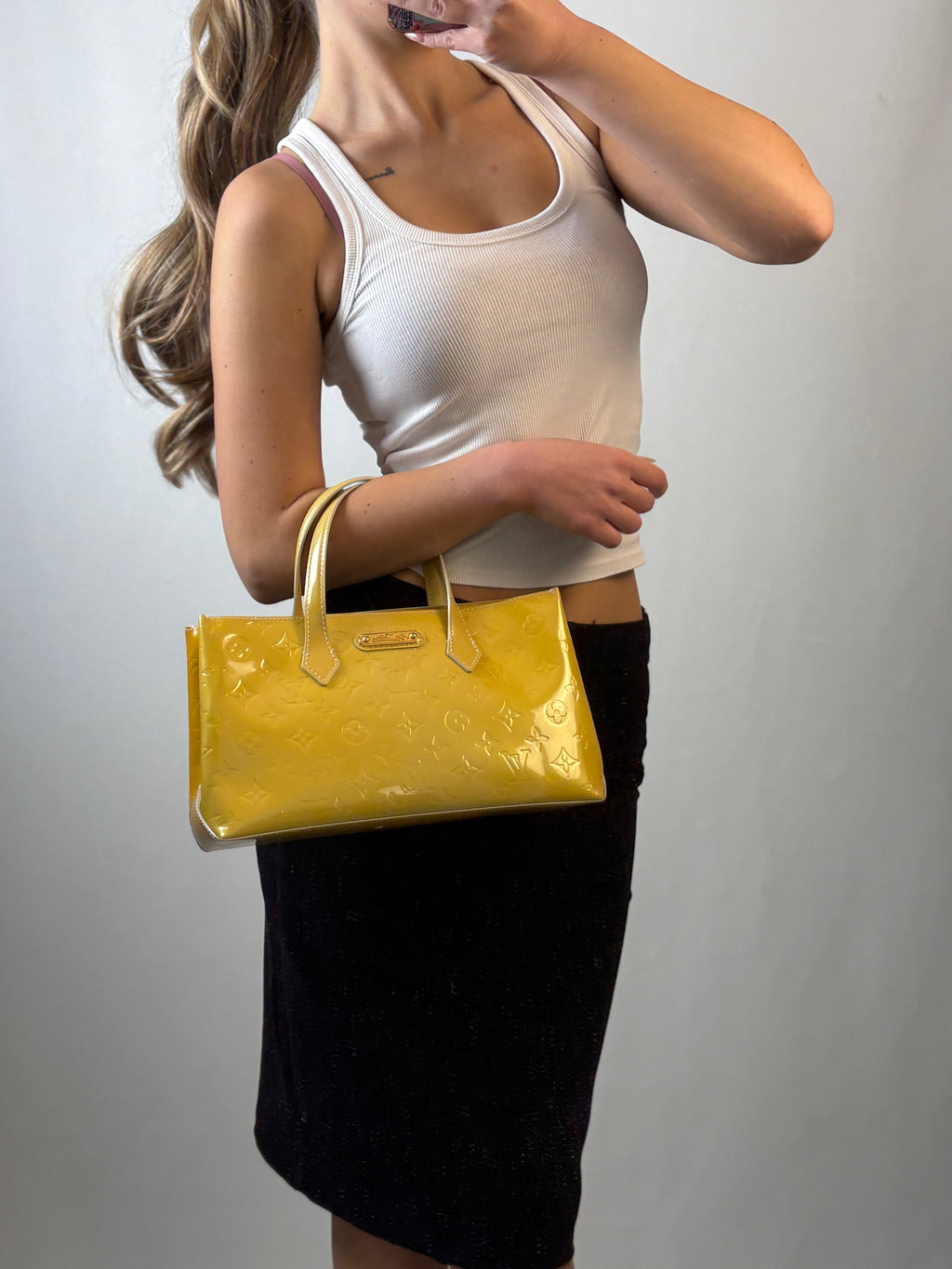 Louis Vuitton Wilshire PM handbag in yellow Monogram Vernis