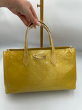 Louis Vuitton Wilshire PM handbag in yellow Monogram Vernis