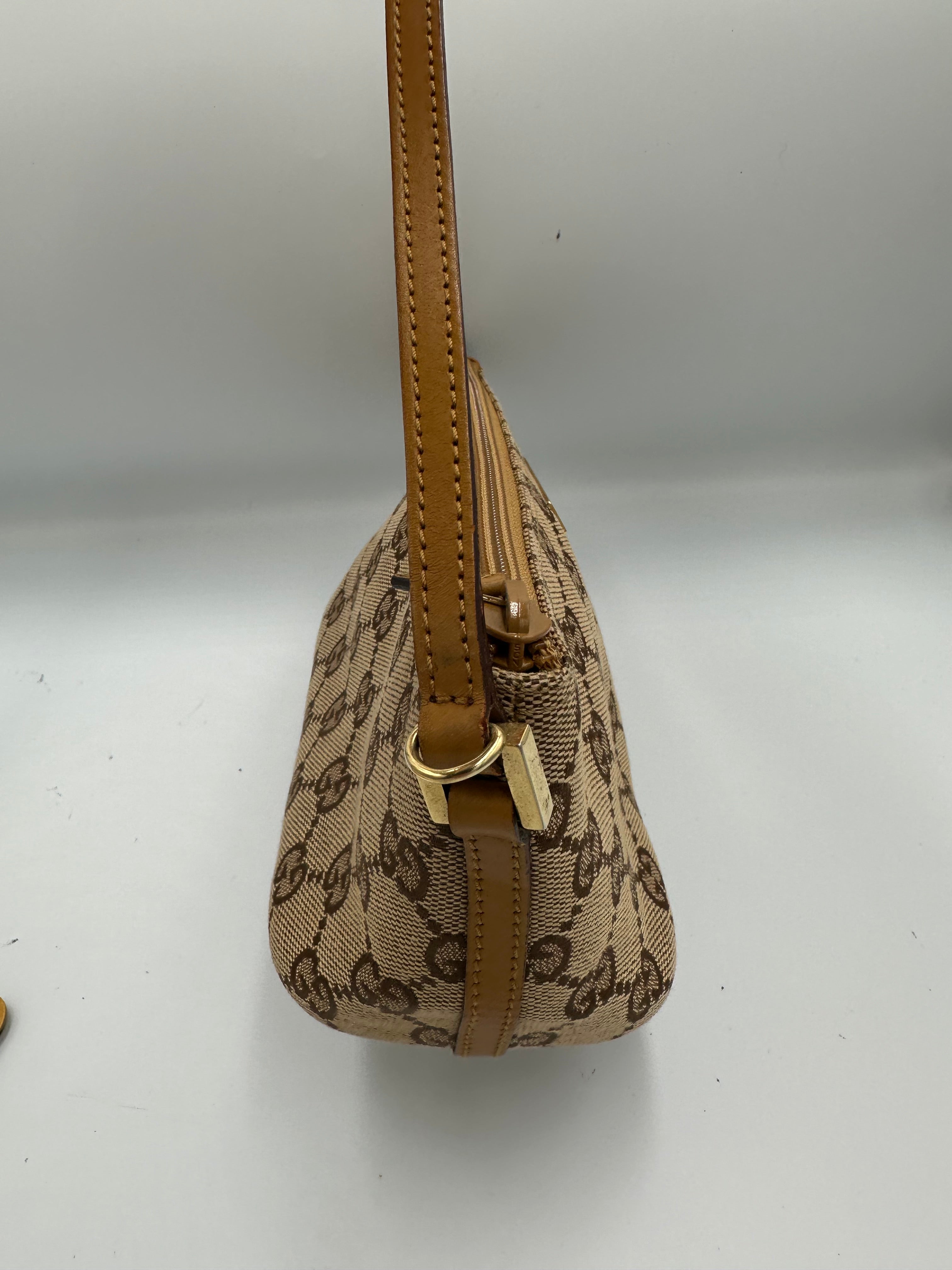 Gucci boat monogram pochette