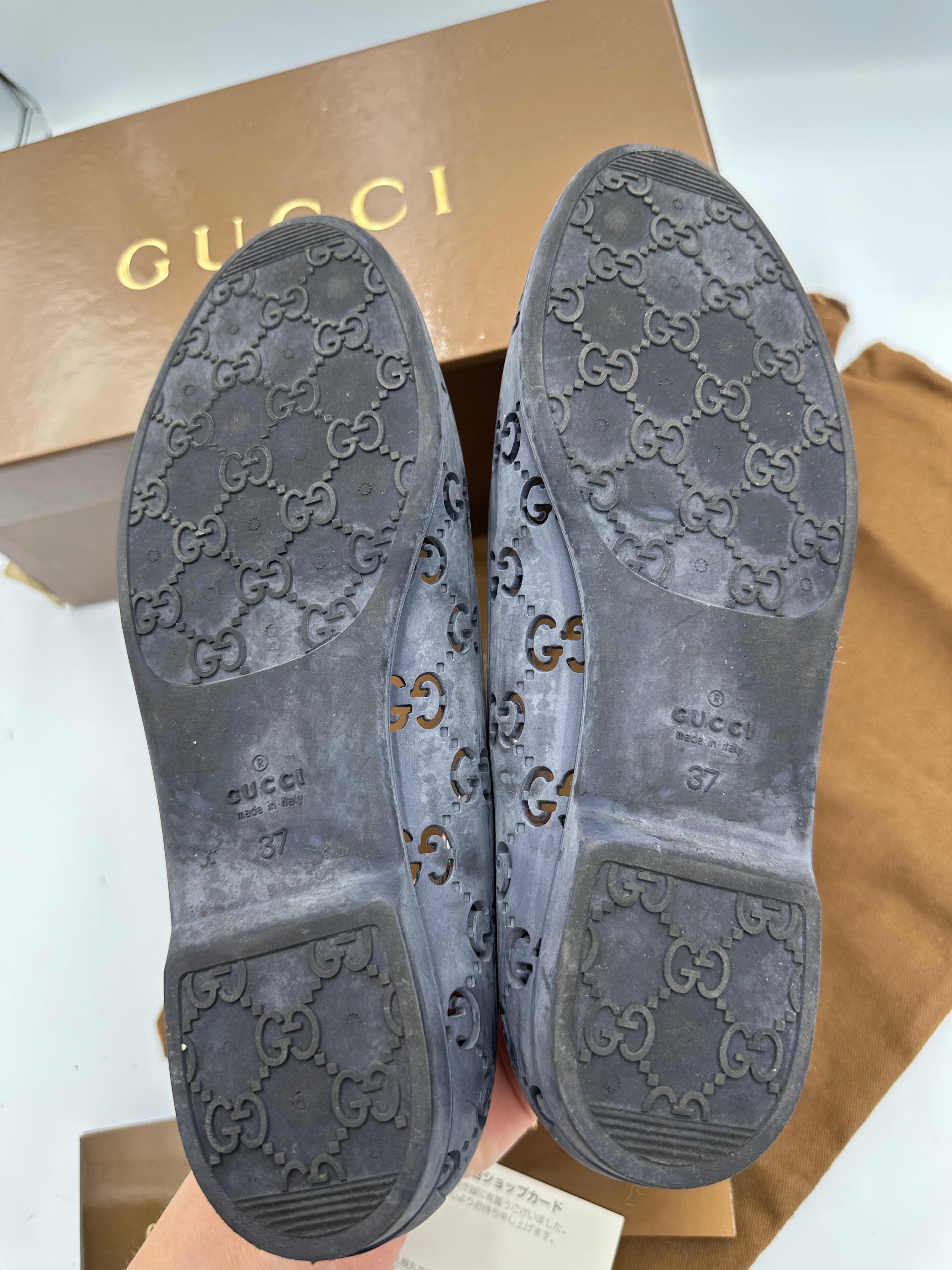 Gucci Monogram navy rubber flats