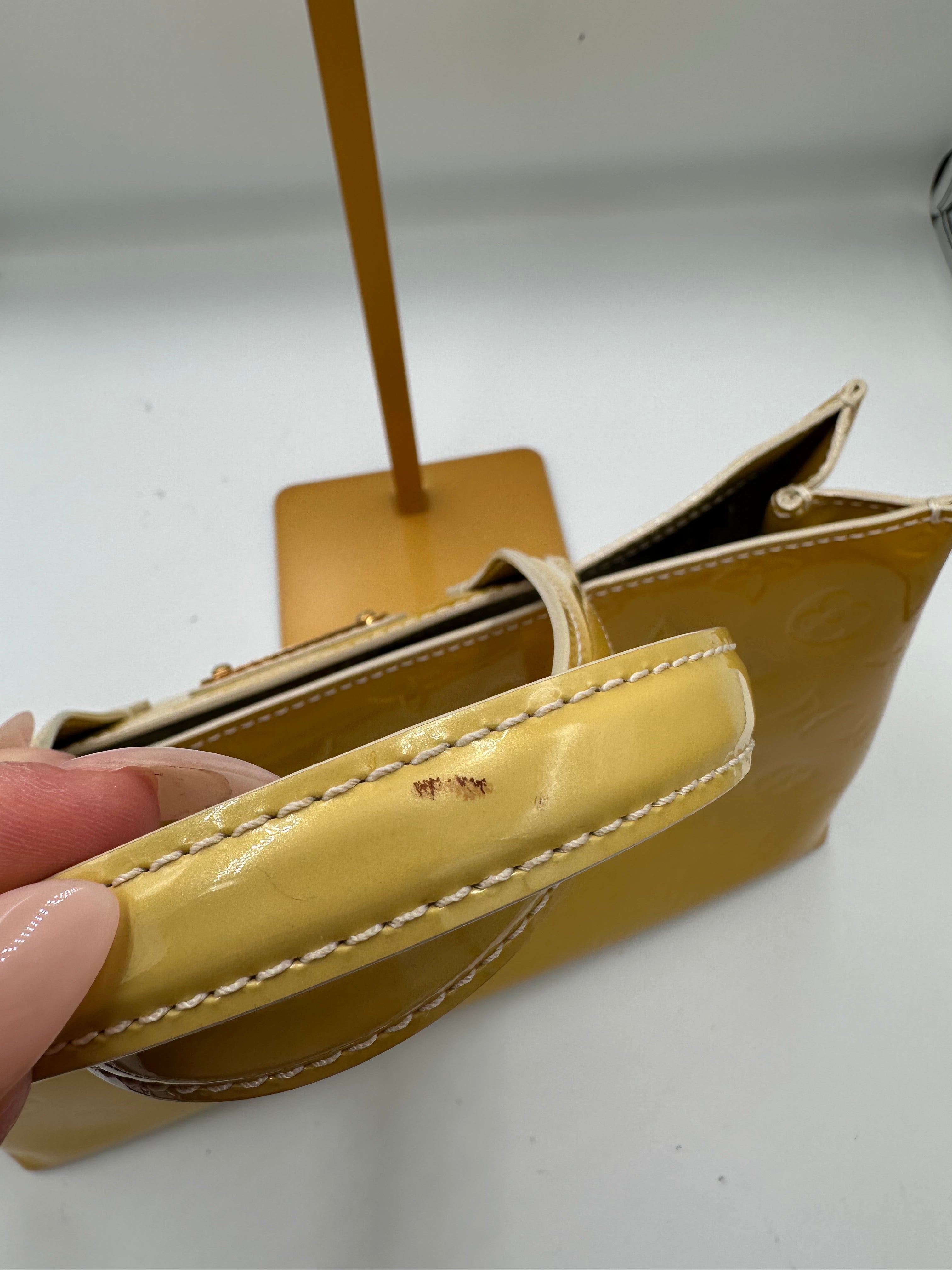 Louis Vuitton Wilshire PM handbag in yellow Monogram Vernis