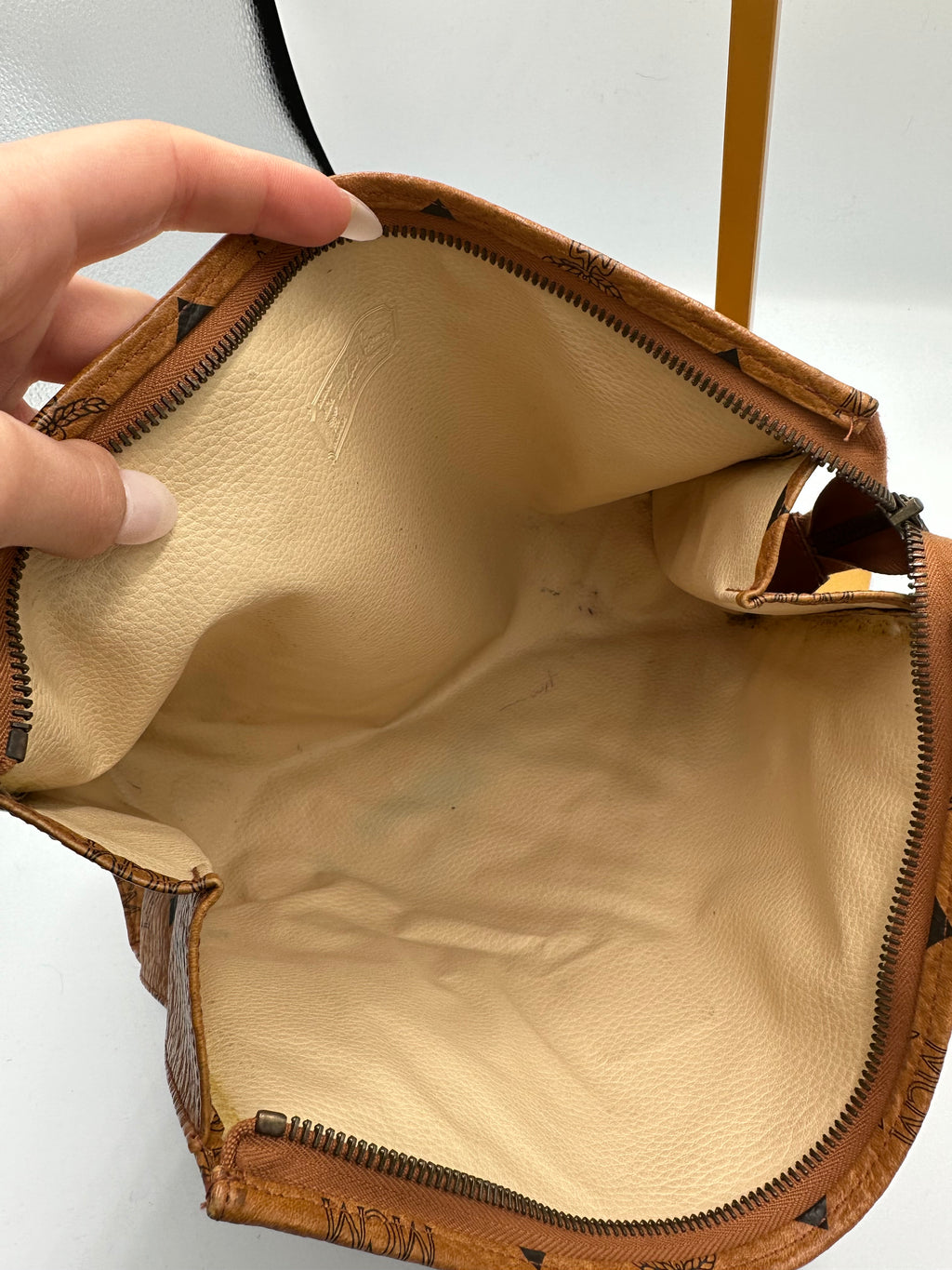 MCM Visetus Leather clutch bag with gold hardware unisex