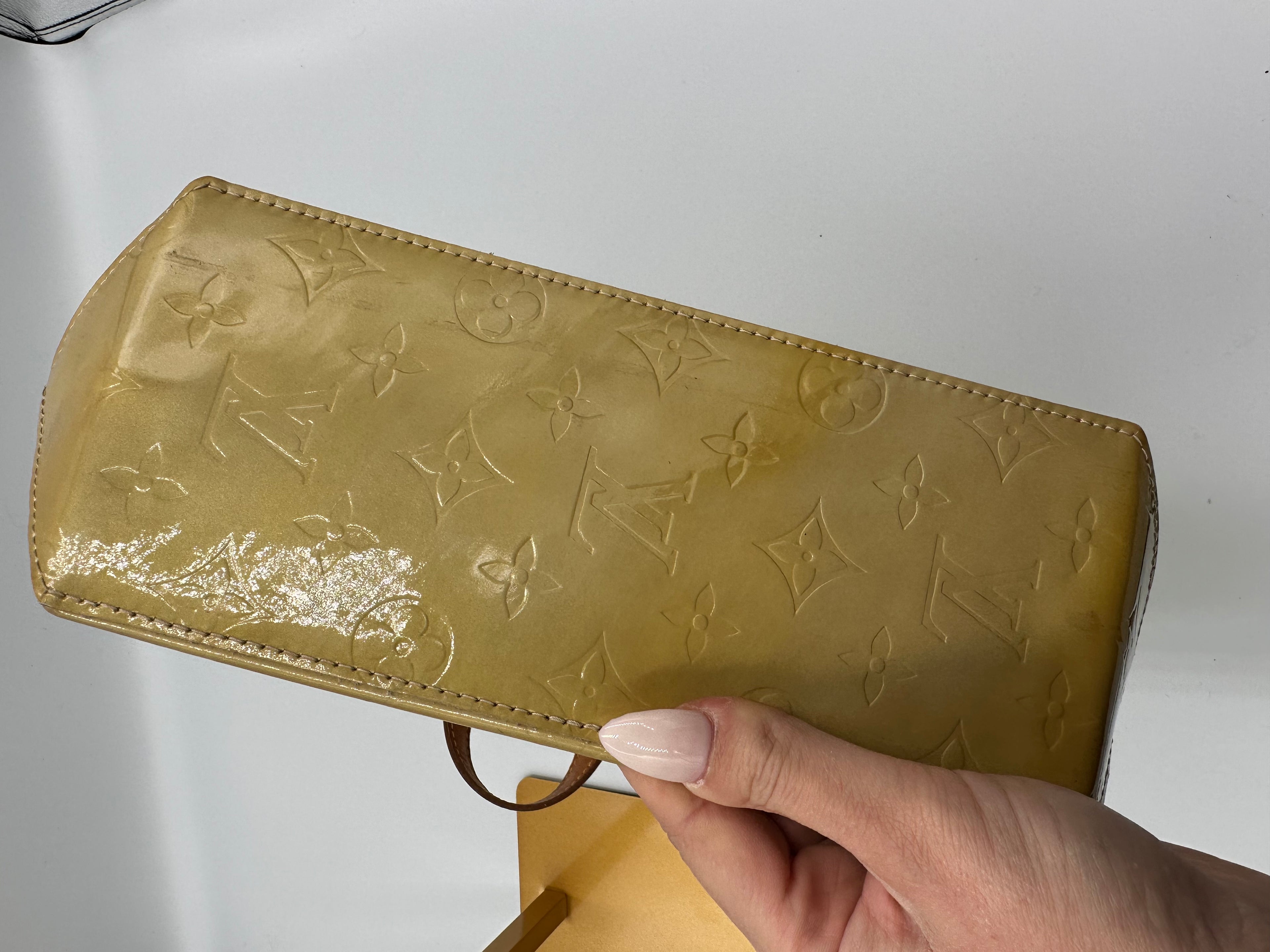 Louis Vuitton Monogram Vernis Trousse PM pastel yellow handbag