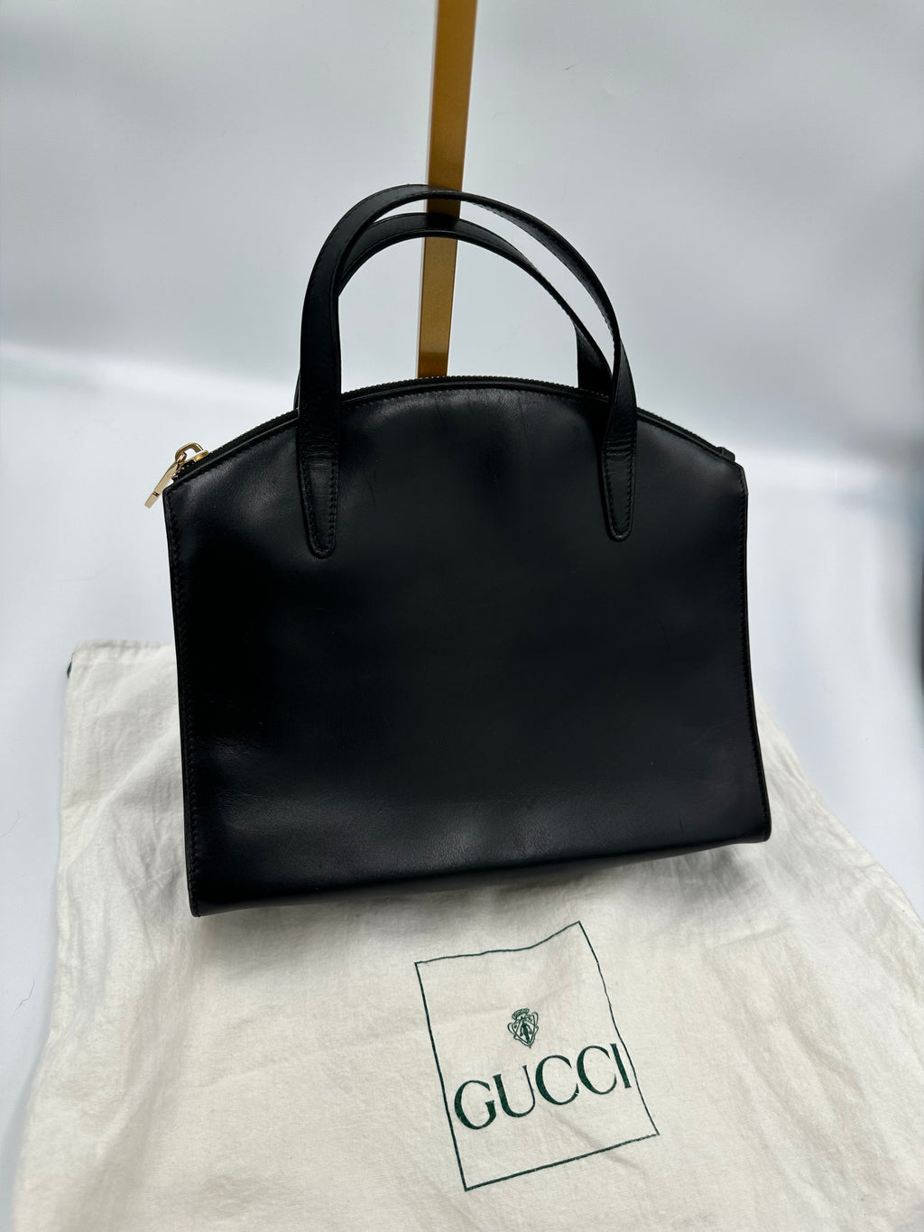 90’s Gucci Jackie black leather handbag with G gold hardware zip